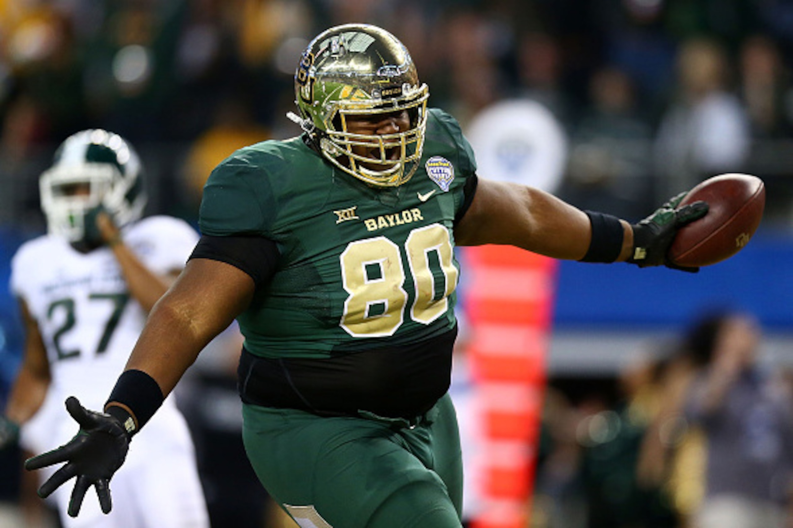 ARLINGTON, TX - JANUARY 01: LaQuan McGowan #80 of the Baylor Bears runs for a touchdown against the Michigan State Spartans during the second half of the Goodyear Cotton Bowl Classic at AT&T Stadium on January 1, 2015 in Arlington, Texas. (Photo by Ron ARLINGTON, TX - JANUARY 01: LaQuan McGowan #80 of the Baylor Bears runs for a touchdown against the Michigan State Spartans during the second half of the Goodyear Cotton Bowl Classic at AT&T Stadium on January 1, 2015 in Arlington, Texas. (Photo by Ron