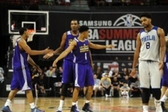 Jul 11, 2015; Las Vegas, NV, USA; Los Angeles Lakers guard D'Angelo Russell (1) congratulates teammates on the floor near the end of an NBA Summer League game against the Philadelphia 76ers at Thomas & Mack Center. The Lakers won 68-60. Mandatory Credit: 