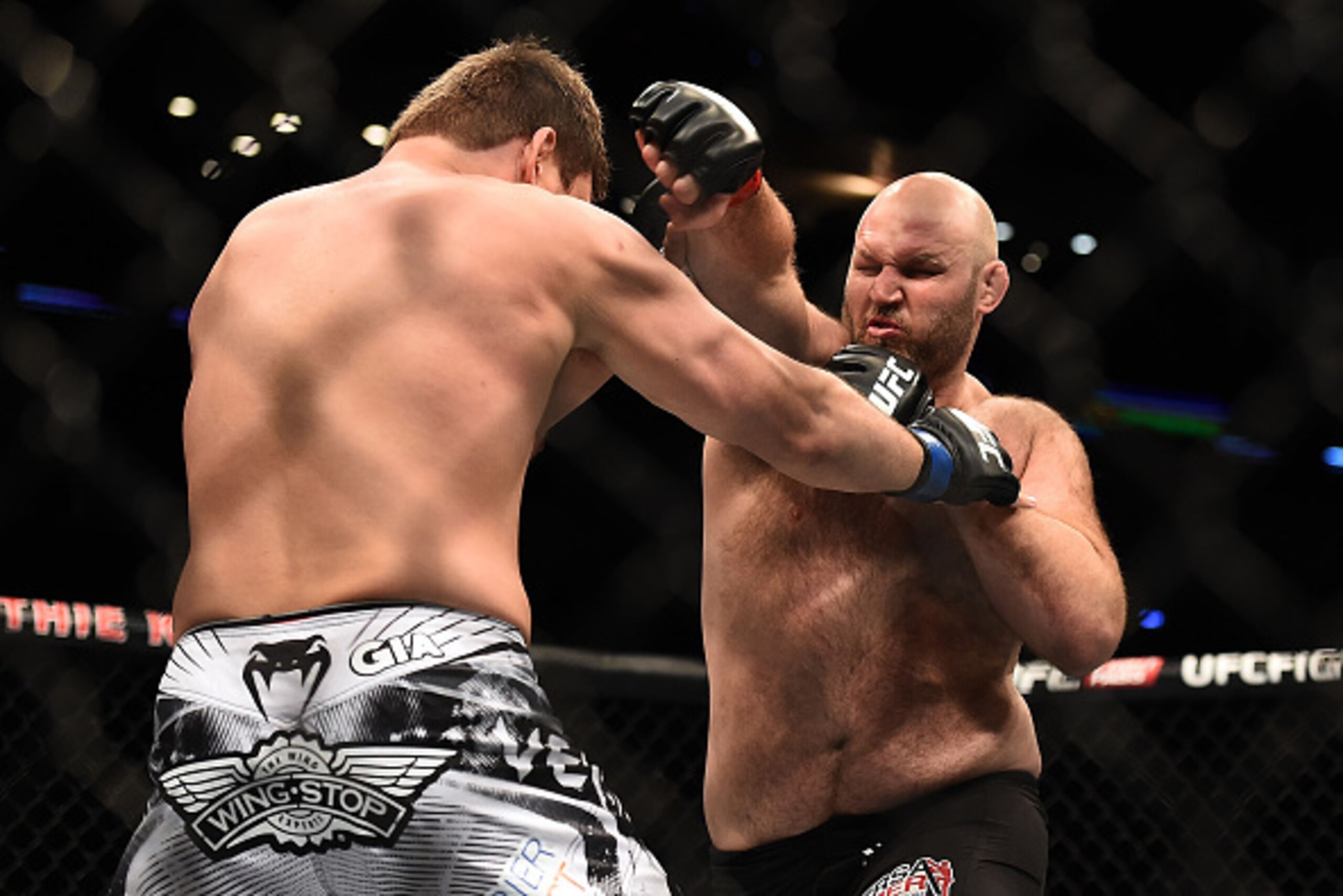 NEW ORLEANS, LA - JUNE 06: Ben Rothwell punches Matt Mitrione in their heavyweight bout during the UFC Fight Night event at Smoothie King Center on June 6, 2015 in New Orleans, Louisiana. (Photo by Stacy Revere/ Zuffa LLC/Zuffa LLC via Getty Images) NEW ORLEANS, LA - JUNE 06: Ben Rothwell punches Matt Mitrione in their heavyweight bout during the UFC Fight Night event at Smoothie King Center on June 6, 2015 in New Orleans, Louisiana. (Photo by Stacy Revere/ Zuffa LLC/Zuffa LLC via Getty Images)