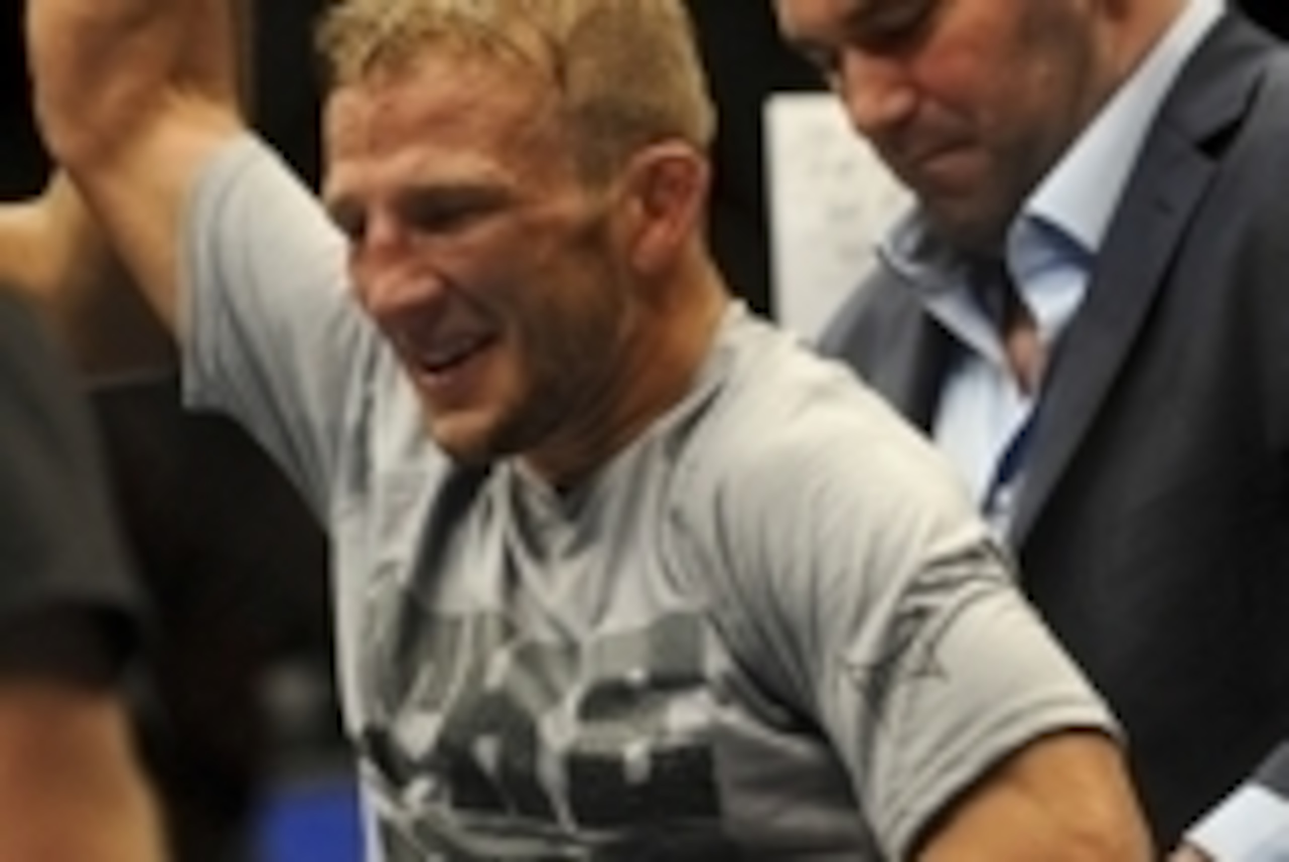 May 24, 2014; Las Vegas, NV, USA; UFC President Dana White puts the bantamweight champion belt on TJ Dillashaw after beating opponent Renan Barao (not pictured) by way of TKO following their UFC 173 bantamweight championship bout at MGM Grand Garden Arena