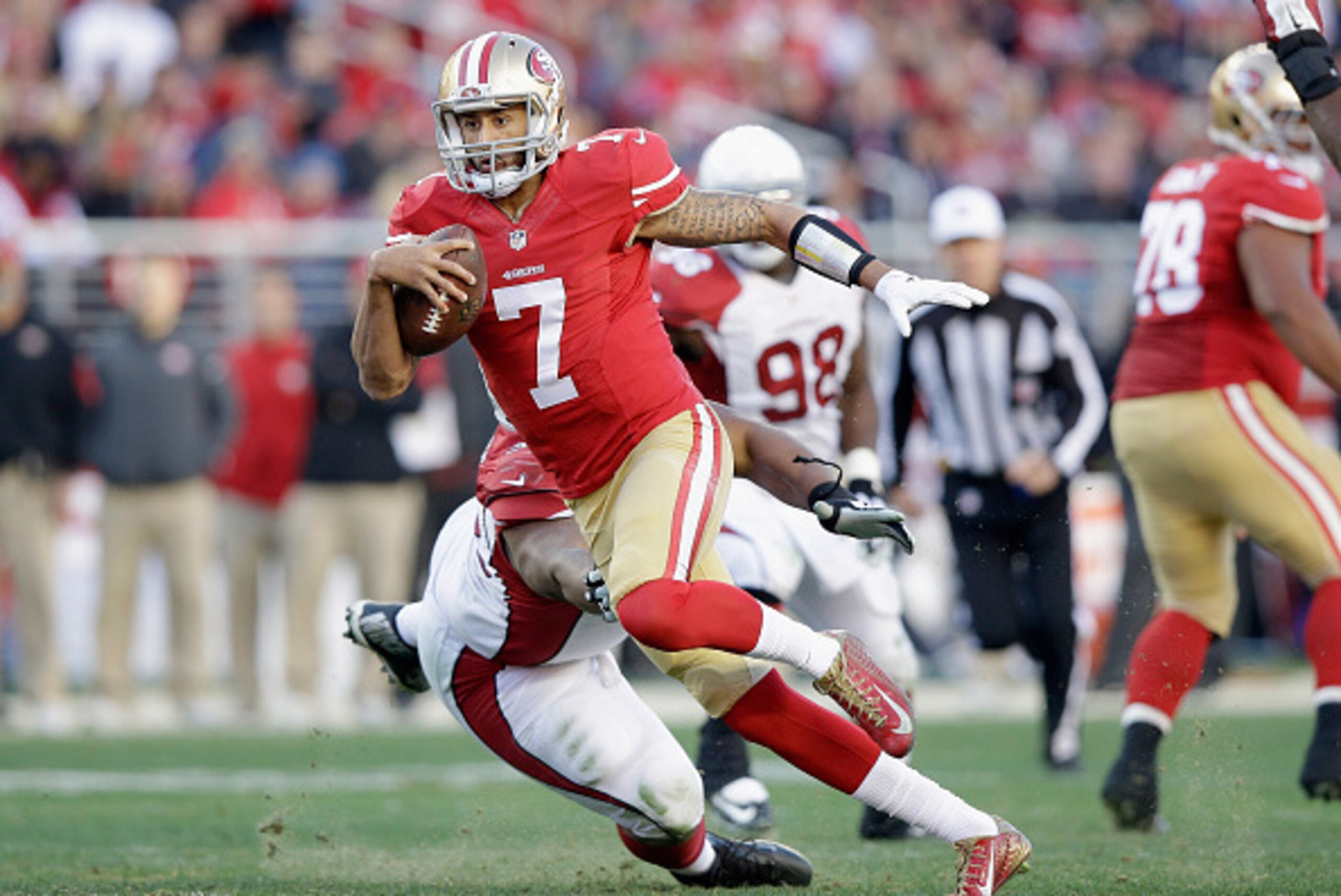 SANTA CLARA, CA - DECEMBER 28:  Colin Kaepernick #7 of the San Francisco 49ers in action against the Arizona Cardinals at Levi's Stadium on December 28, 2014 in Santa Clara, California.  (Photo by Ezra Shaw/Getty Images)