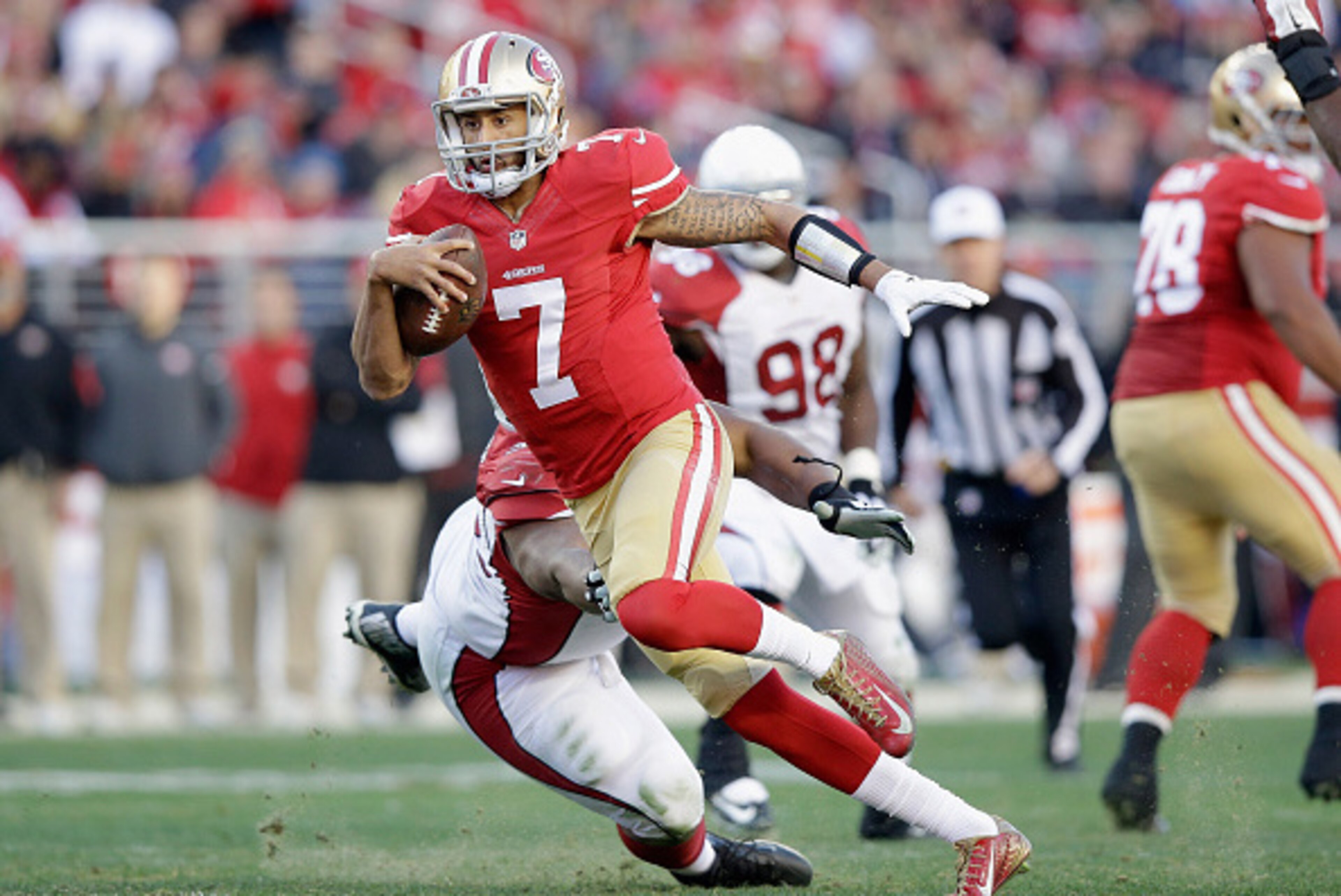 SANTA CLARA, CA - DECEMBER 28:  Colin Kaepernick #7 of the San Francisco 49ers in action against the Arizona Cardinals at Levi's Stadium on December 28, 2014 in Santa Clara, California.  (Photo by Ezra Shaw/Getty Images)