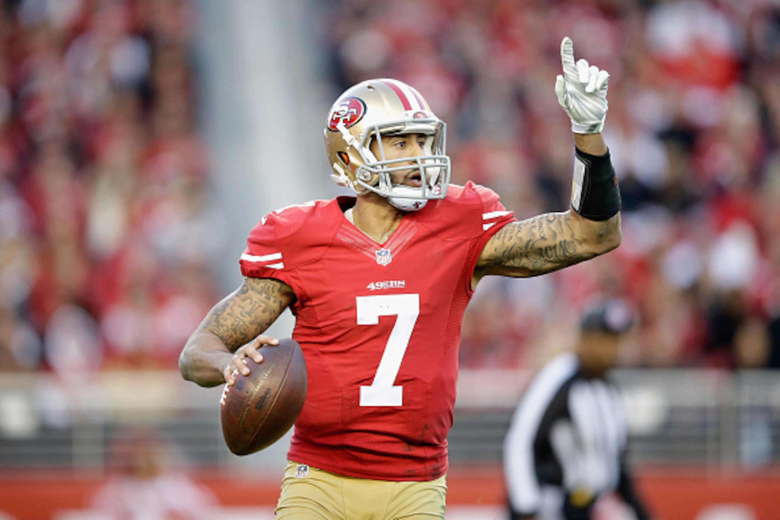 SANTA CLARA, CA - DECEMBER 28:  Colin Kaepernick #7 of the San Francisco 49ers in action against the Arizona Cardinals at Levi's Stadium on December 28, 2014 in Santa Clara, California.  (Photo by Ezra Shaw/Getty Images)