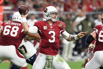 GLENDALE, AZ - NOVEMBER 09:  Quarterback Carson Palmer #3 of the Arizona Cardinals throws a pass against the St Louis Rams at University of Phoenix Stadium on November 9, 2014 in Glendale, Arizona.  (Photo by Norm Hall/Getty Images)