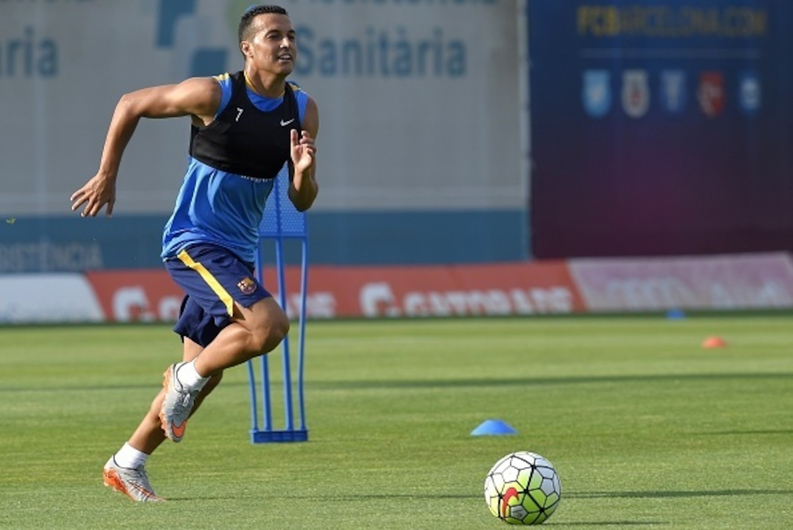 Barcelona's forward Pedro Rodriguez goes for a ball during a training session at the Sports Center FC Barcelona Joan Gamper in Sant Joan Despi, near Barcelona on July 15, 2015. AFP PHOTO/ LLUIS GENE (Photo credit should read LLUIS GENE/AFP/Getty Im Barcelona's forward Pedro Rodriguez goes for a ball during a training session at the Sports Center FC Barcelona Joan Gamper in Sant Joan Despi, near Barcelona on July 15, 2015. AFP PHOTO/ LLUIS GENE (Photo credit should read LLUIS GENE/AFP/Getty Im