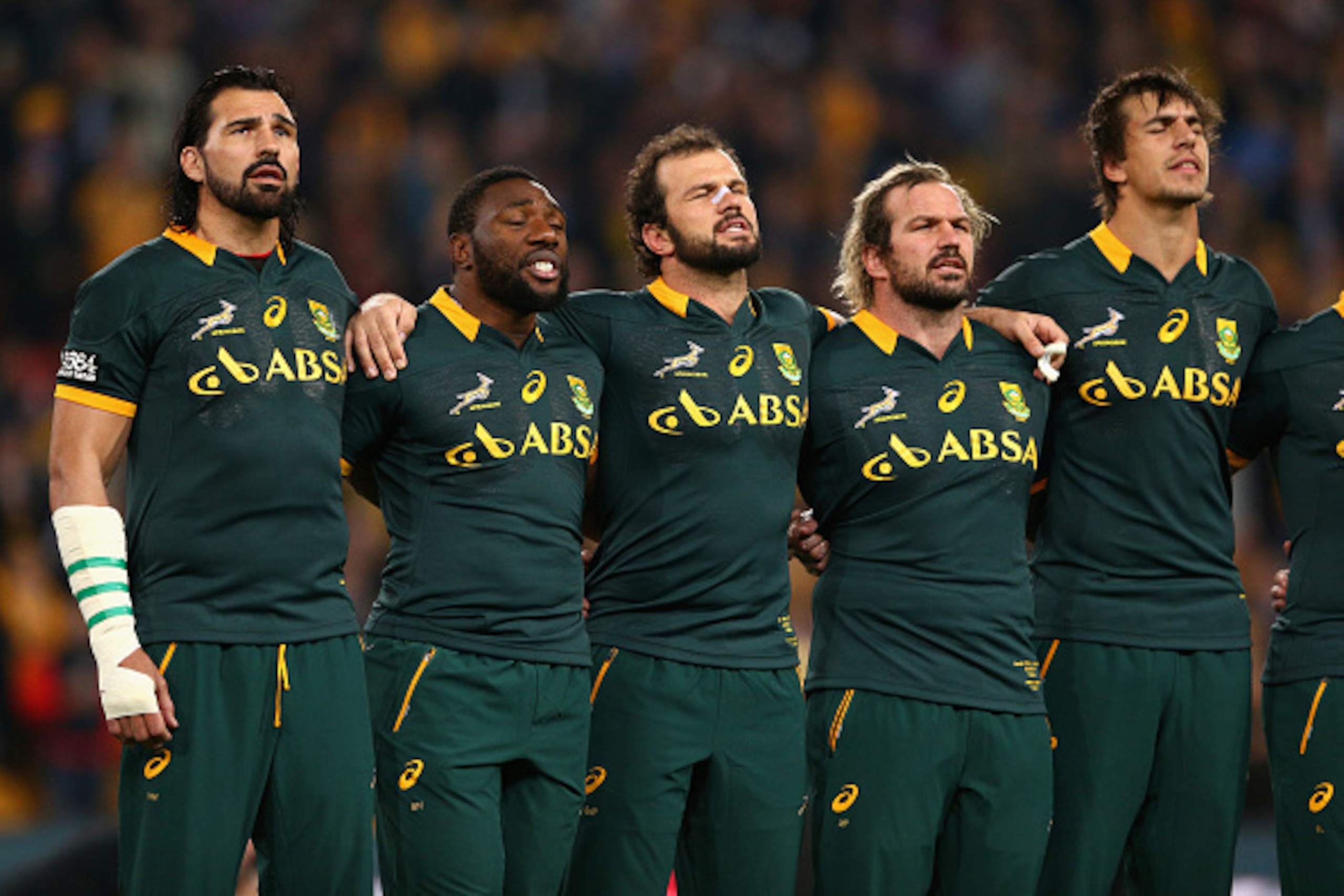 BRISBANE, AUSTRALIA - JULY 18: Springboks players sing the South African national anthem during The Rugby Championship match between the Australian Wallabies and the South Africa Springboks at Suncorp Stadium on July 18, 2015 in Brisbane, Australia. (Pho BRISBANE, AUSTRALIA - JULY 18: Springboks players sing the South African national anthem during The Rugby Championship match between the Australian Wallabies and the South Africa Springboks at Suncorp Stadium on July 18, 2015 in Brisbane, Australia. (Pho
