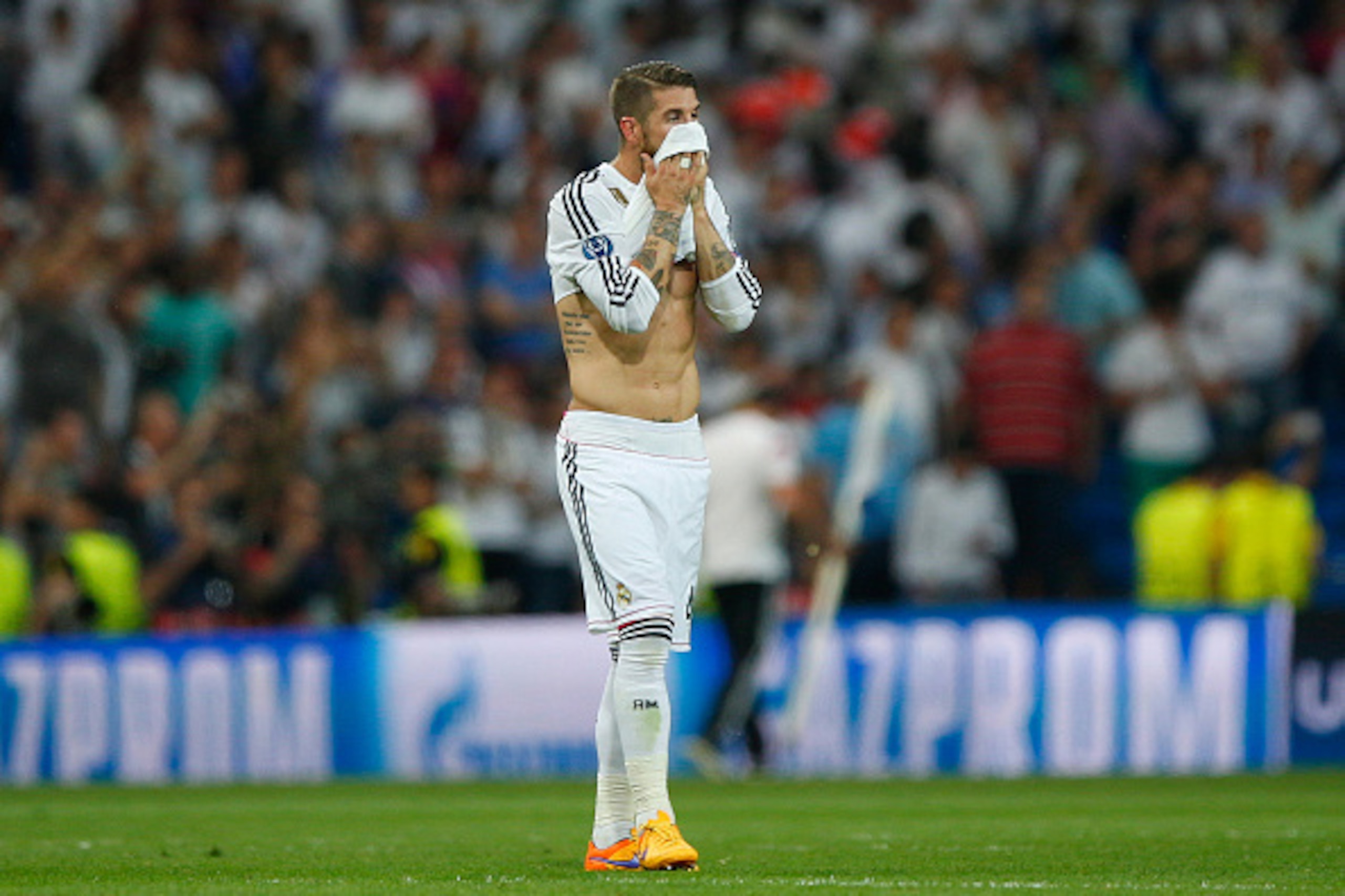 MADRID, SPAIN - MAY 13: A dejected Sergio Ramos of Real Madrid reacts following his team's exit from the competition during the UEFA Champions League Semi Final, second leg match between Real Madrid and Juventus at Estadio Santiago Bernabeu on May 13, 20 MADRID, SPAIN - MAY 13: A dejected Sergio Ramos of Real Madrid reacts following his team's exit from the competition during the UEFA Champions League Semi Final, second leg match between Real Madrid and Juventus at Estadio Santiago Bernabeu on May 13, 20