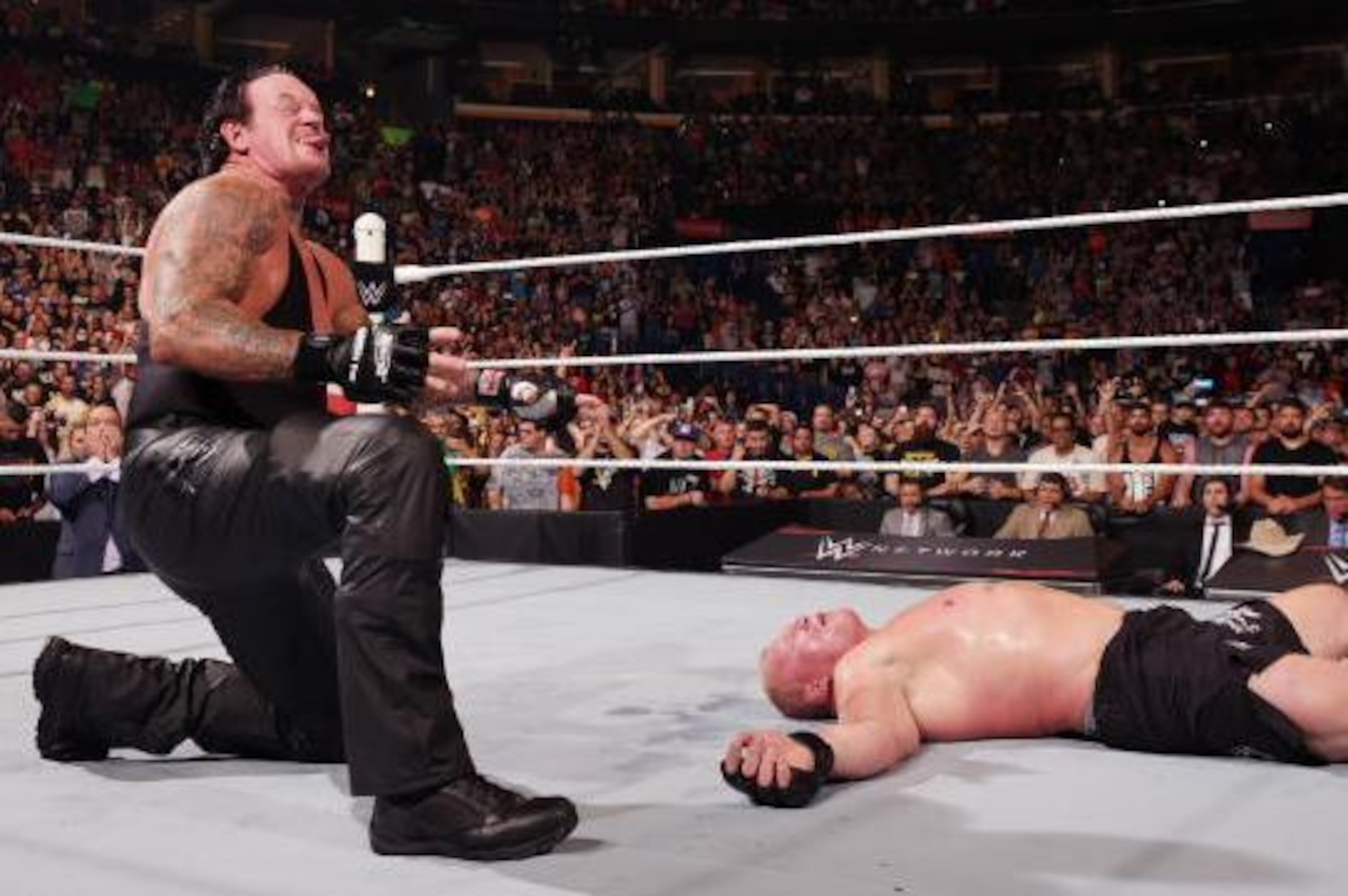 Taker puts Lesnar down
