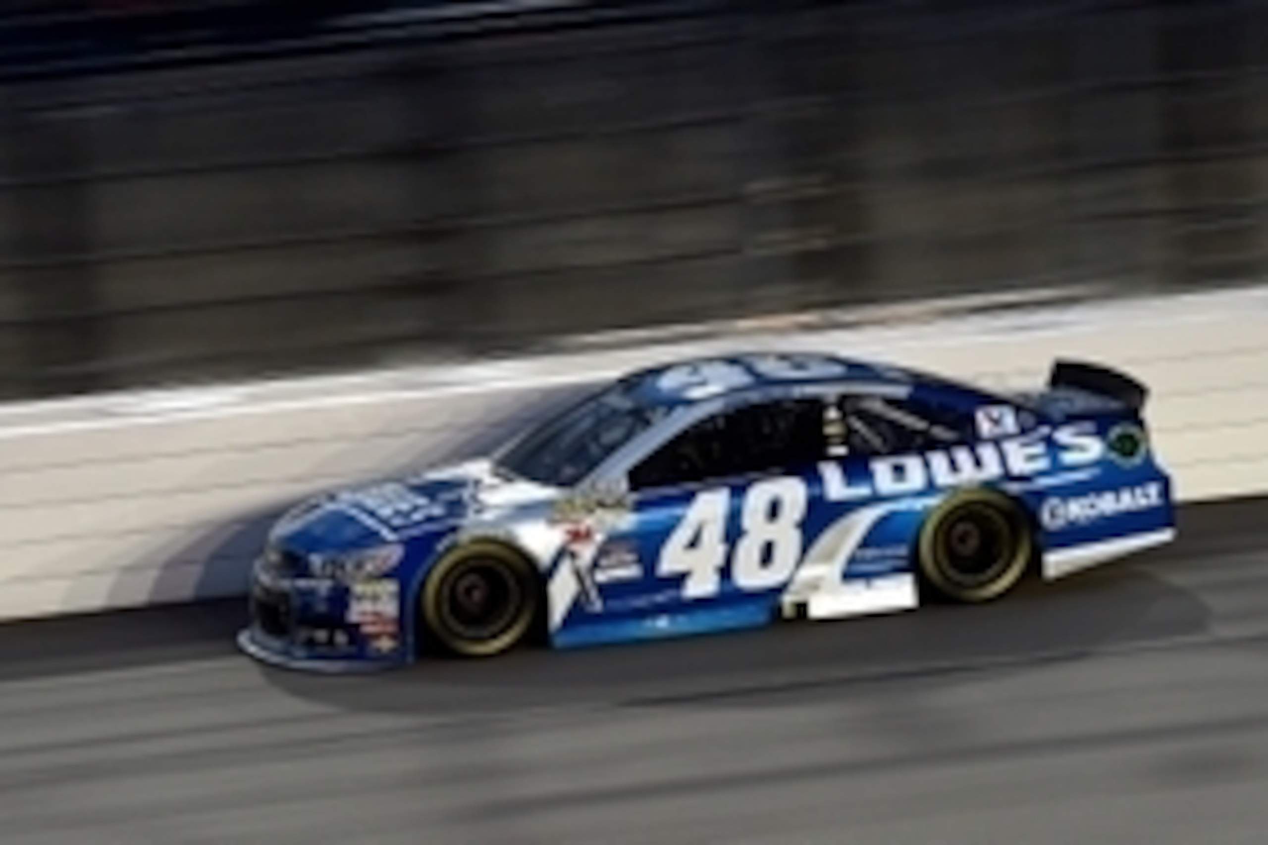 May 9, 2015; Kansas City, KS, USA; NASCAR Sprint Cup Series driver Jimmie Johnson (48) races during the Spongebob Squarepants 400 at Kansas Speedway. Mandatory Credit: Jasen Vinlove-USA TODAY Sports