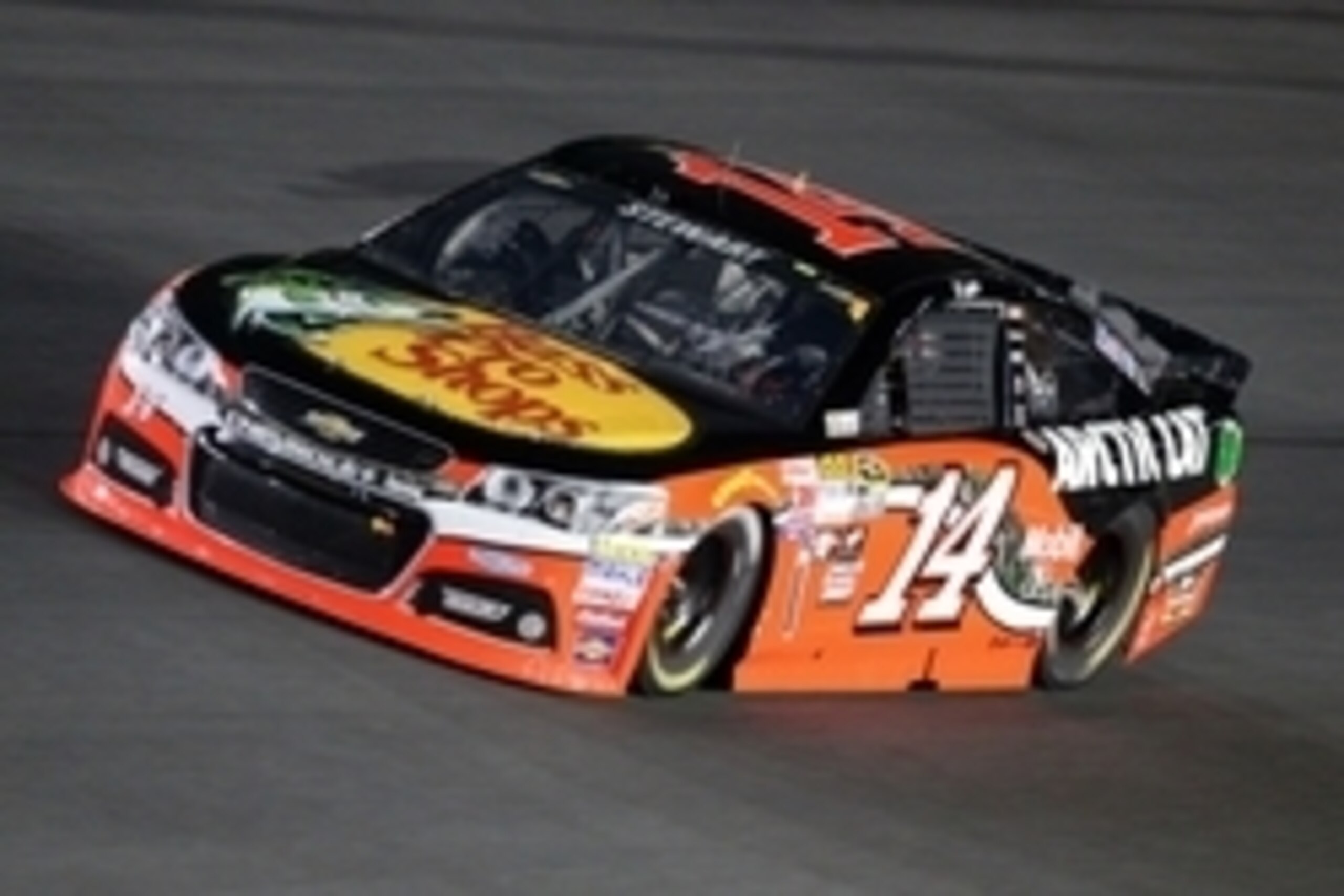 May 16, 2015; Concord, NC, USA; NASCAR Sprint Cup Series driver Tony Stewart (14) during the Sprint All-Star Race at Charlotte Motor Speedway. Mandatory Credit: Randy Sartin-USA TODAY Sports