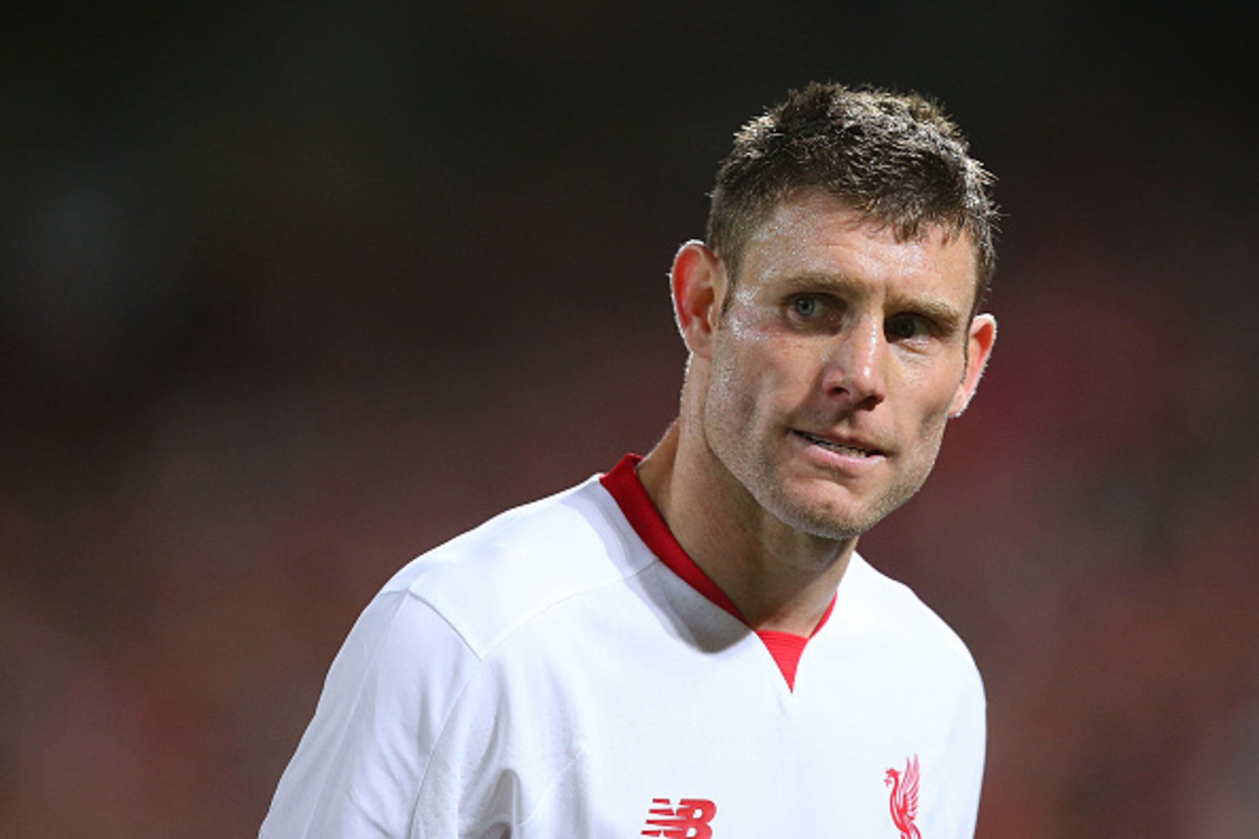 BRISBANE, AUSTRALIA - JULY 17:  James Milner of  Liverpool FC looks on during the international friendly match between Brisbane Roar and Liverpool FC at Suncorp Stadium on July 17, 2015 in Brisbane, Australia.  (Photo by Chris Hyde/Getty Images)