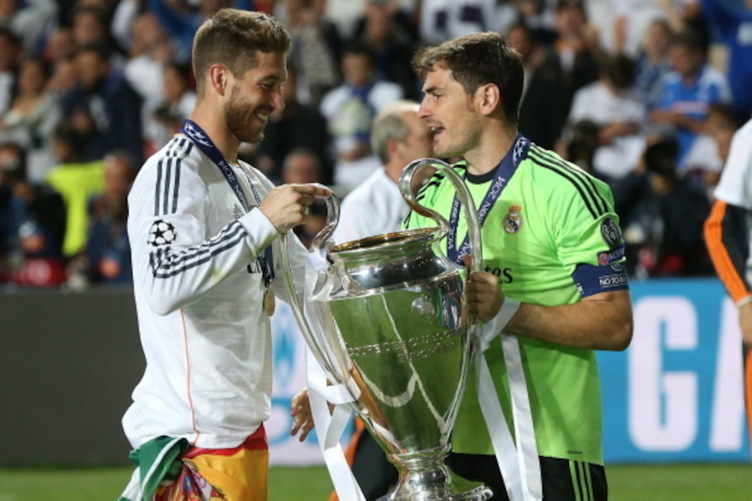 LISBON, PORTUGAL - MAY 24: Goalkeeper of Real Madrid Iker Casillas celebrates with Sergio Ramos of Real Madrid (left) after the UEFA Champions League final between Real Madrid and Atletico de Madrid at Estadio da Luz stadium on May 24, 2014 in Lisbon, Por