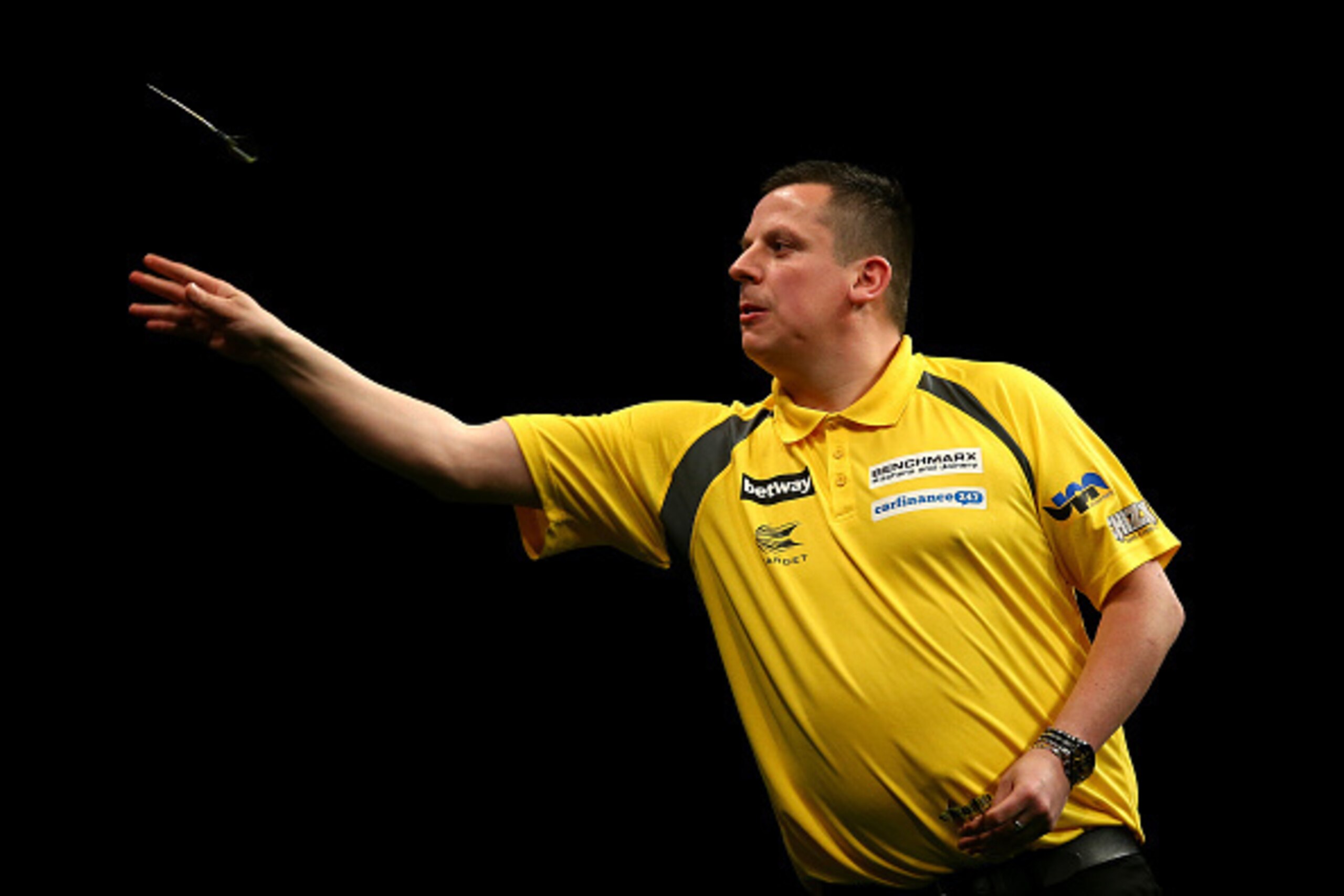 LONDON, ENGLAND - MAY 21: Dave Chisnall of England in action during his semi-final match against Gary Anderson of Scotland during the Betway Premier League at The 02 Arena on May 21, 2015 in London, England. (Photo by Charlie Crowhurst/Getty Images)