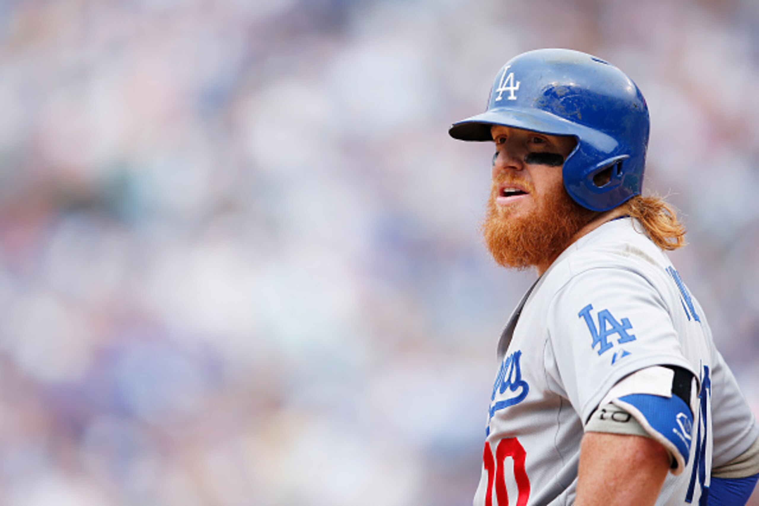 CHICAGO, IL - JUNE 25: Justin Turner #10 of the Los Angeles Dodgers looks on against the Chicago Cubs during the game at Wrigley Field on June 25, 2015 in Chicago, Illinois. The Dodgers defeated the Cubs 4-0. (Photo by Joe Robbins/Getty Images)
