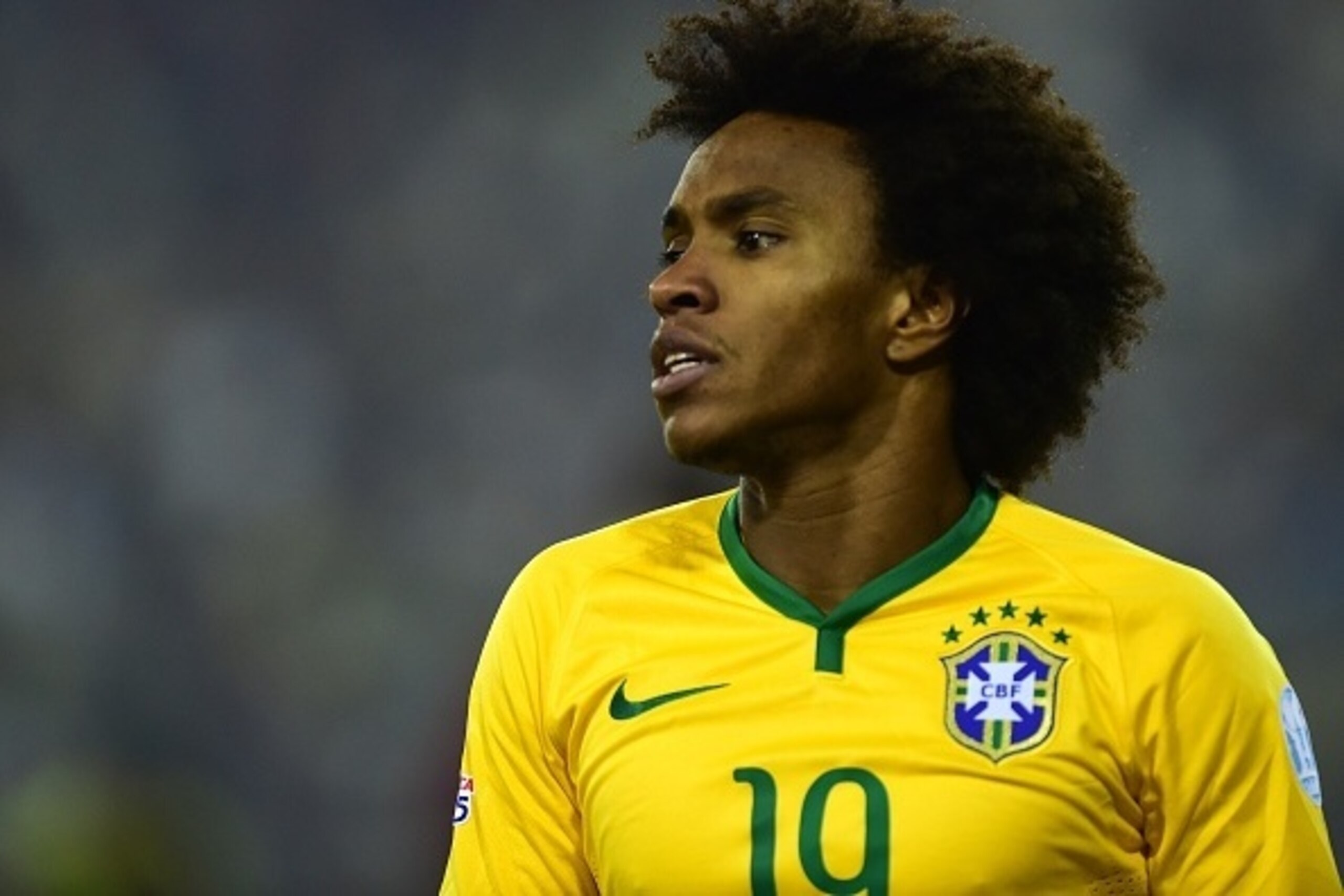 Brazil's midfielder Willian is pictured during the 2015 Copa America football championship match against Venezuela, in Santiago, on June 21, 2015.    AFP PHOTO / MARTIN BERNETTI        (Photo credit should read MARTIN BERNETTI/AFP/Getty Images)