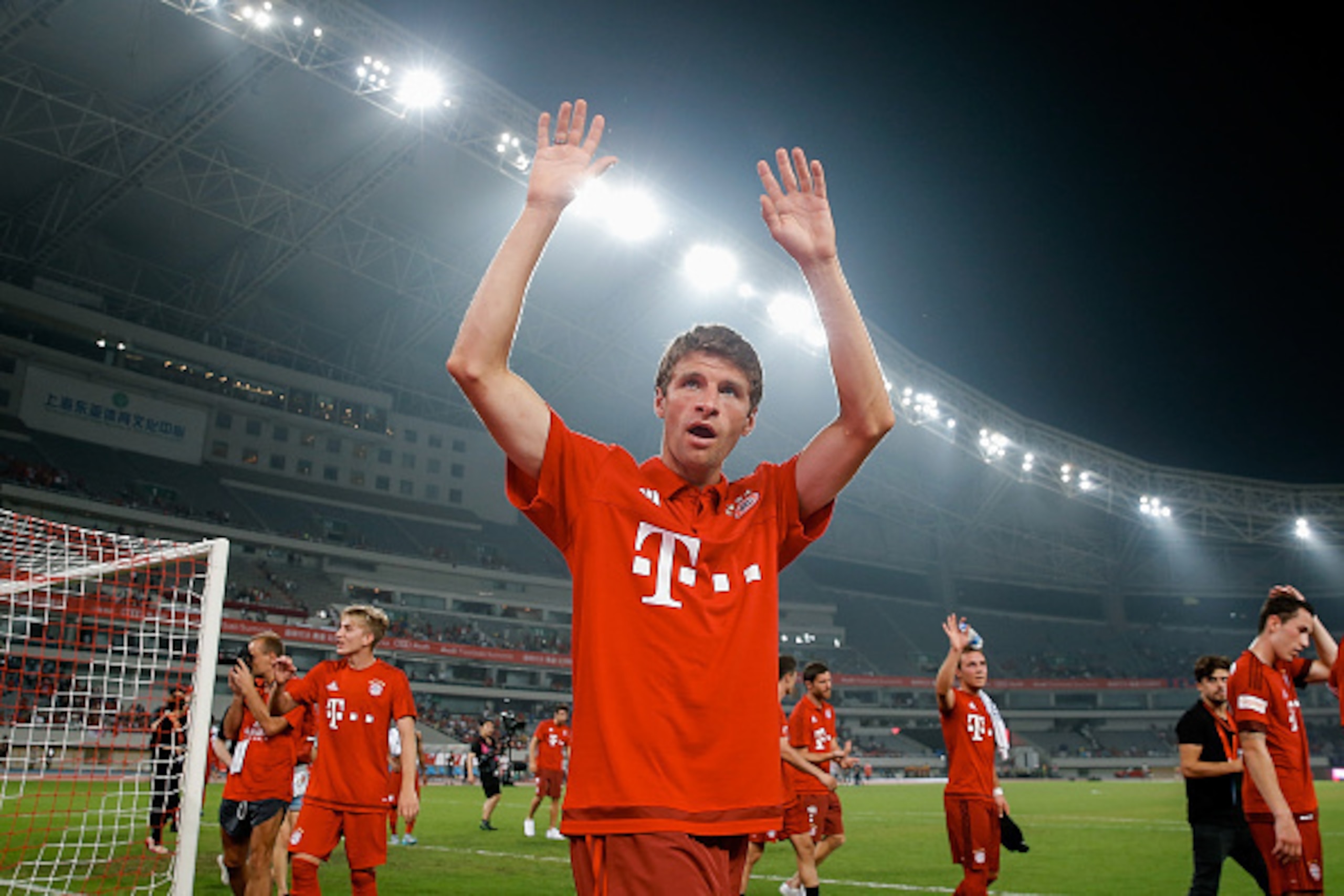 SHANGHAI, CHINA - JULY 21: Thomas Mueller of FC Bayern Muenchen gestures to fans after winning the international friendly match between FC Bayern Muenchen and Inter Milan of the Audi Football Summit 2015 at Shanghai Stadium on July 21, 2015 in Shanghai, SHANGHAI, CHINA - JULY 21: Thomas Mueller of FC Bayern Muenchen gestures to fans after winning the international friendly match between FC Bayern Muenchen and Inter Milan of the Audi Football Summit 2015 at Shanghai Stadium on July 21, 2015 in Shanghai,
