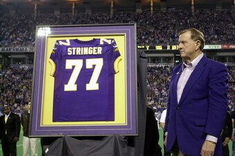 09 Dec 2001 : Minnesota Vikings owner Red McCombs stands next to Korey Stringer's retired jersey during a ceremony in his honor at the game at Hubert H. Humphrey Metrodome in Minneapolis, Minnesota. The Vikings beat the Giants 28-16. DIGITAL IMAGE . Manda