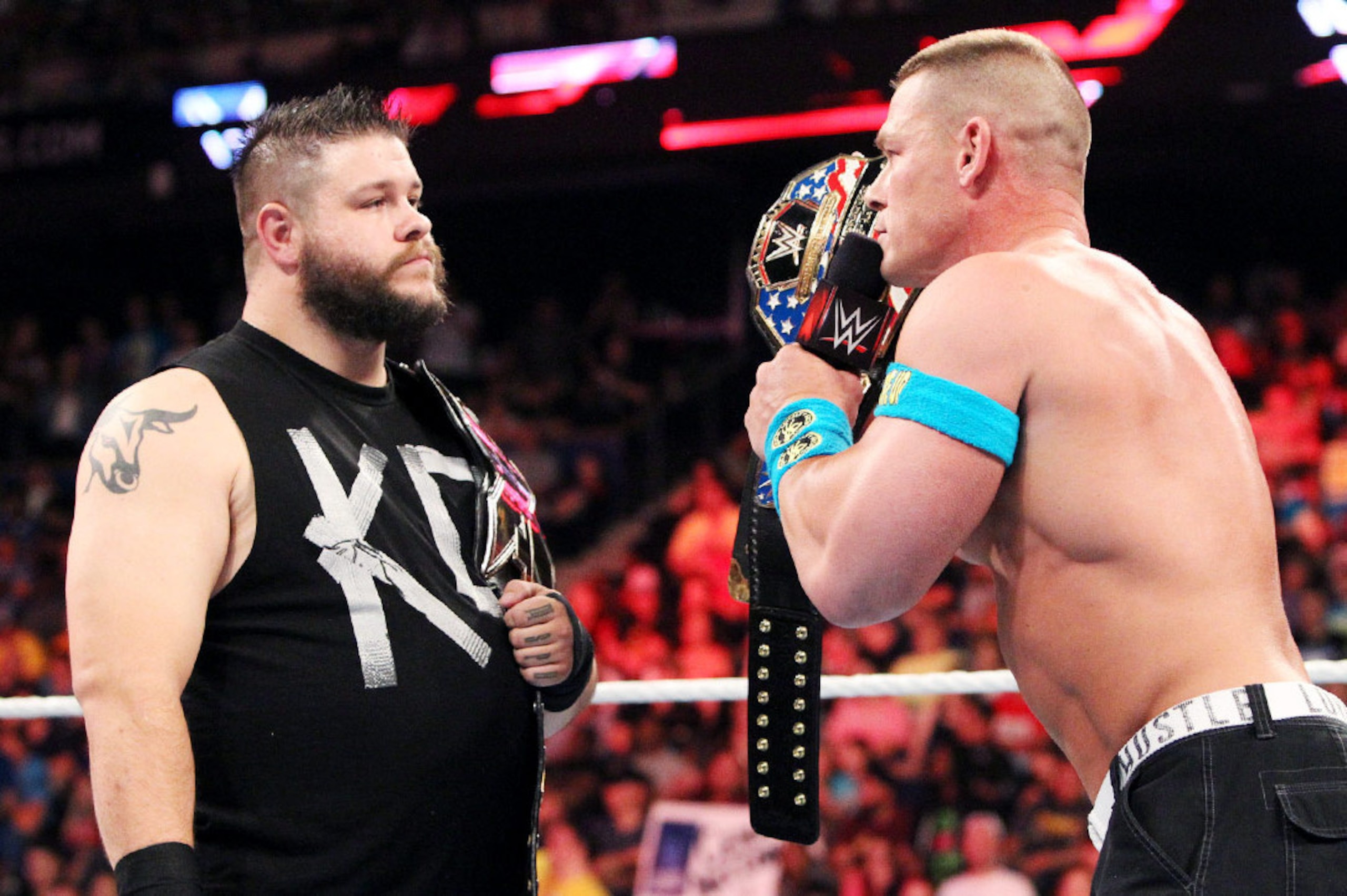 Kevin Owens in a faceoff with John Cena.