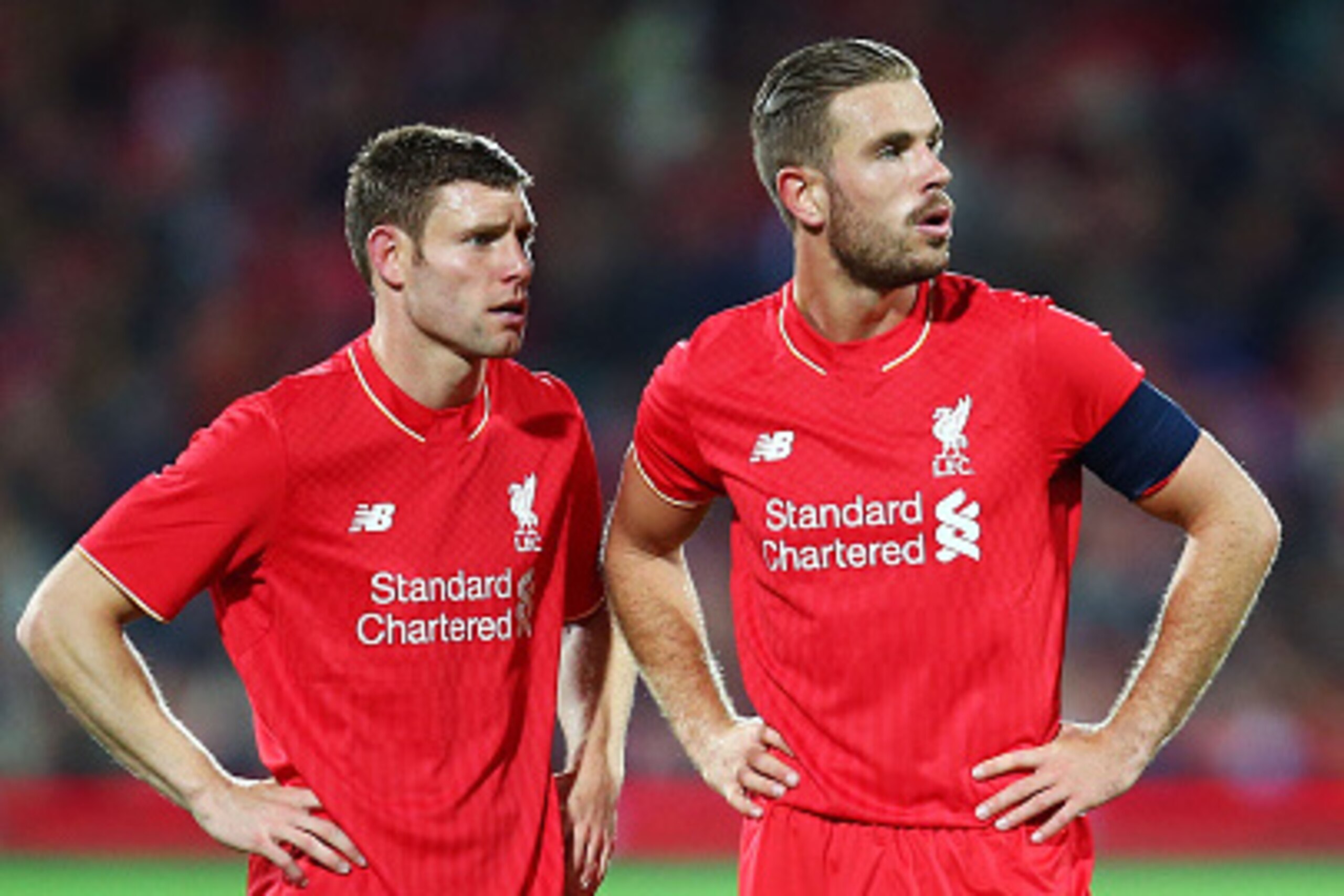 ADELAIDE, AUSTRALIA - JULY 20:  James Milner (L) of Liverpool talks to Jordan Henderson of Liverpool (R) during the international friendly match between Adelaide United and Liverpool FC at Adelaide Oval on July 20, 2015 in Adelaide, Australia.  (Photo by 
