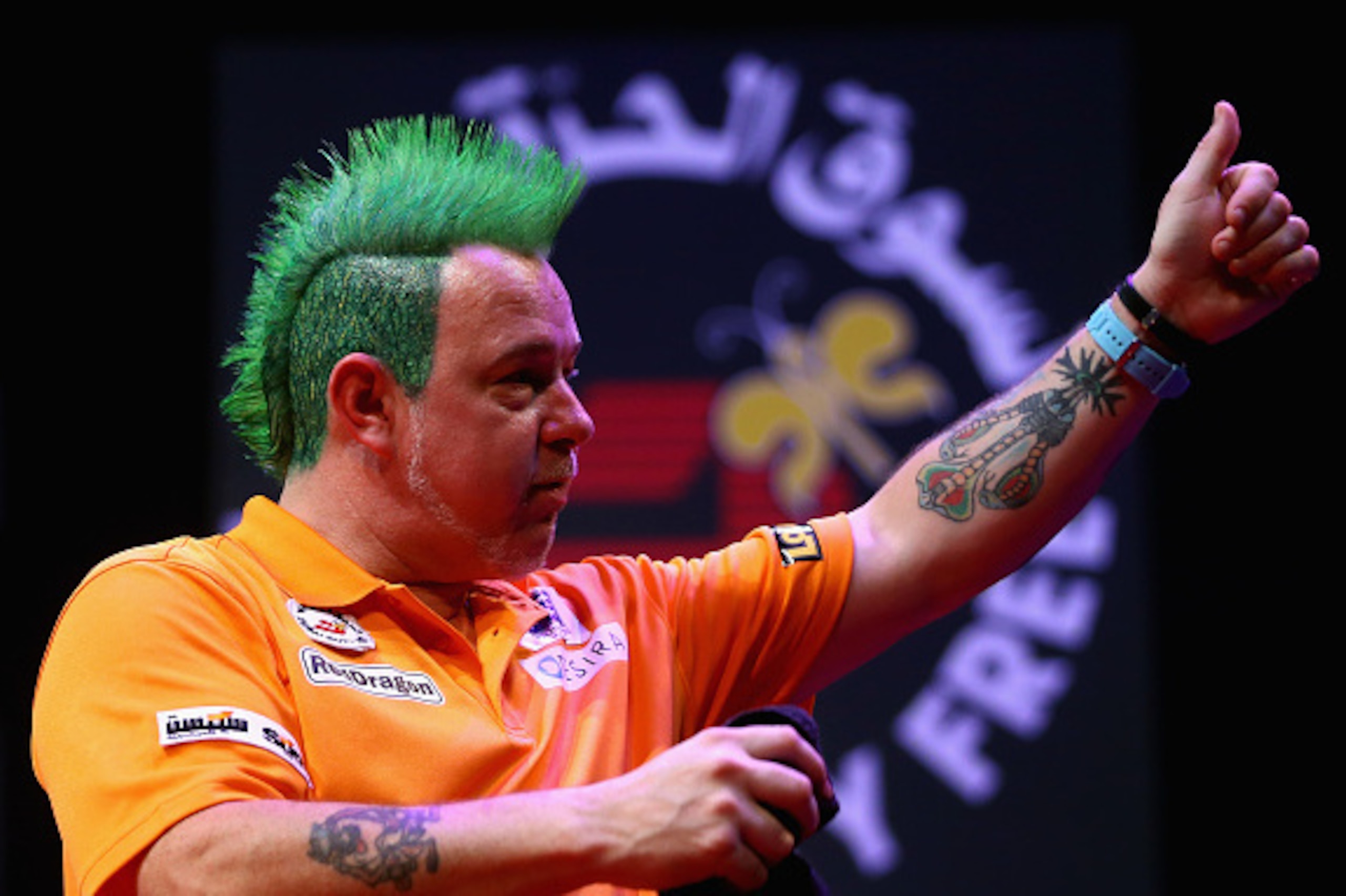 DUBAI, UNITED ARAB EMIRATES - MAY 28: Peter Wright of Scotland acknowledge the crowd  during the 2015 Dubai Duty Free Darts Masters Quarter-Final match at Dubai Duty Free Tennis Stadium on May 28, 2015 in Dubai, United Arab Emirates.  (Photo by Francois N