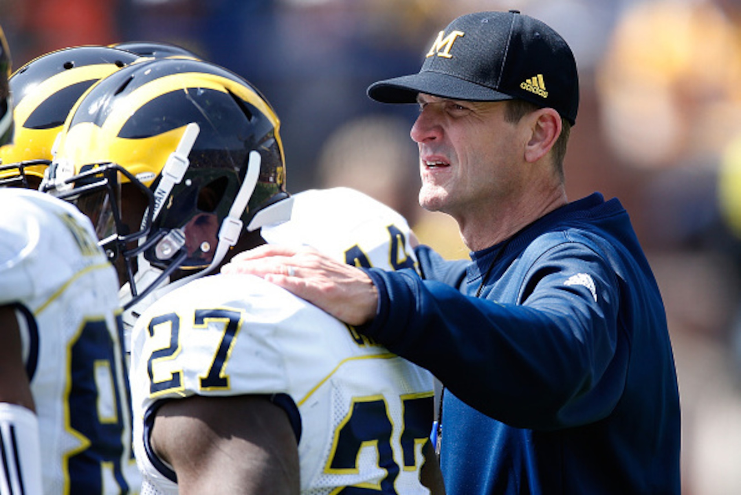 ANN ARBOR, MI - APRIL 04: Head coach Jim Harbaugh of the Michigan Wolverines looks on during the Michigan Football Spring Game on April 4, 2015 at Michigan Stadium in Ann Arbor, Michigan.  (Photo by Gregory Shamus/Getty Images)