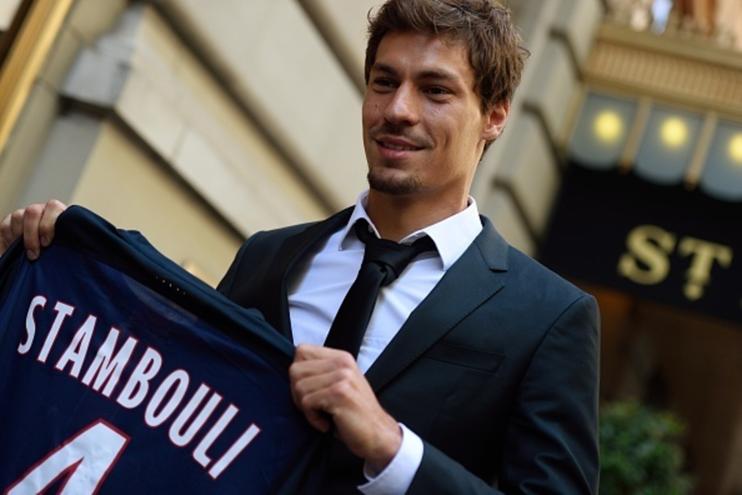 Soccer player Benjamin Stambouli holds up his new jersey from team Paris Saint-Germain July 23, 2015 after a press conference in New York. AFP PHOTO/DON EMMERT (Photo credit should read DON EMMERT/AFP/Getty Images) Soccer player Benjamin Stambouli holds up his new jersey from team Paris Saint-Germain July 23, 2015 after a press conference in New York. AFP PHOTO/DON EMMERT (Photo credit should read DON EMMERT/AFP/Getty Images)