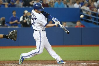 TORONTO, CANADA - JULY 17: Josh Donaldson #20 of the Toronto Blue Jays hits a two-run home run in the fifth inning during MLB game action against the Tampa Bay Rays on July 17, 2015 at Rogers Centre in Toronto, Ontario, Canada. (Photo by Tom Szczerbowski/