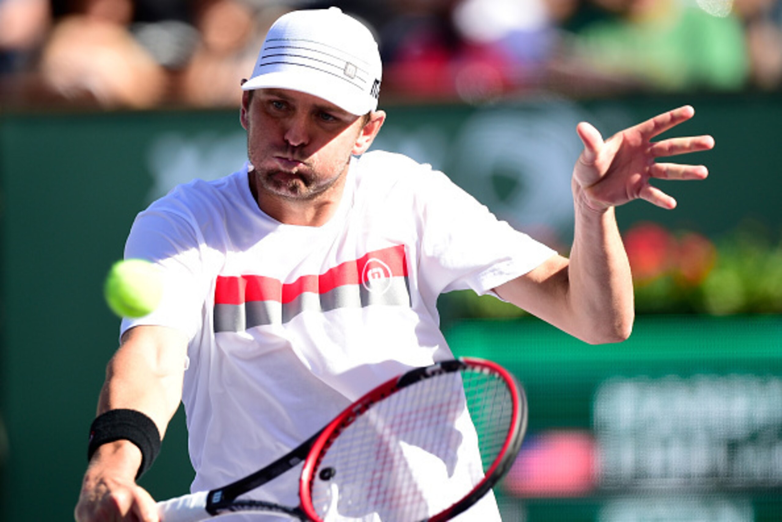 INDIAN WELLS, CA - MARCH 12:  Mardy Fish returns a backhand volley in his match against Ryan Harrison during the BNP Parisbas Open at the Indian Wells Tennis Garden on March 12, 2015 in Indian Wells, California.  (Photo by Harry How/Getty Images)