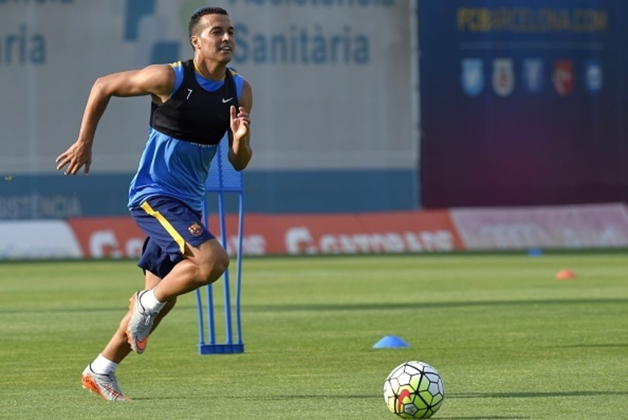 Barcelona's forward Pedro Rodriguez goes for a ball during a training session at the Sports Center FC Barcelona Joan Gamper in Sant Joan Despi, near Barcelona on July 15, 2015. AFP PHOTO/ LLUIS GENE (Photo credit should read LLUIS GENE/AFP/Getty Im Barcelona's forward Pedro Rodriguez goes for a ball during a training session at the Sports Center FC Barcelona Joan Gamper in Sant Joan Despi, near Barcelona on July 15, 2015. AFP PHOTO/ LLUIS GENE (Photo credit should read LLUIS GENE/AFP/Getty Im