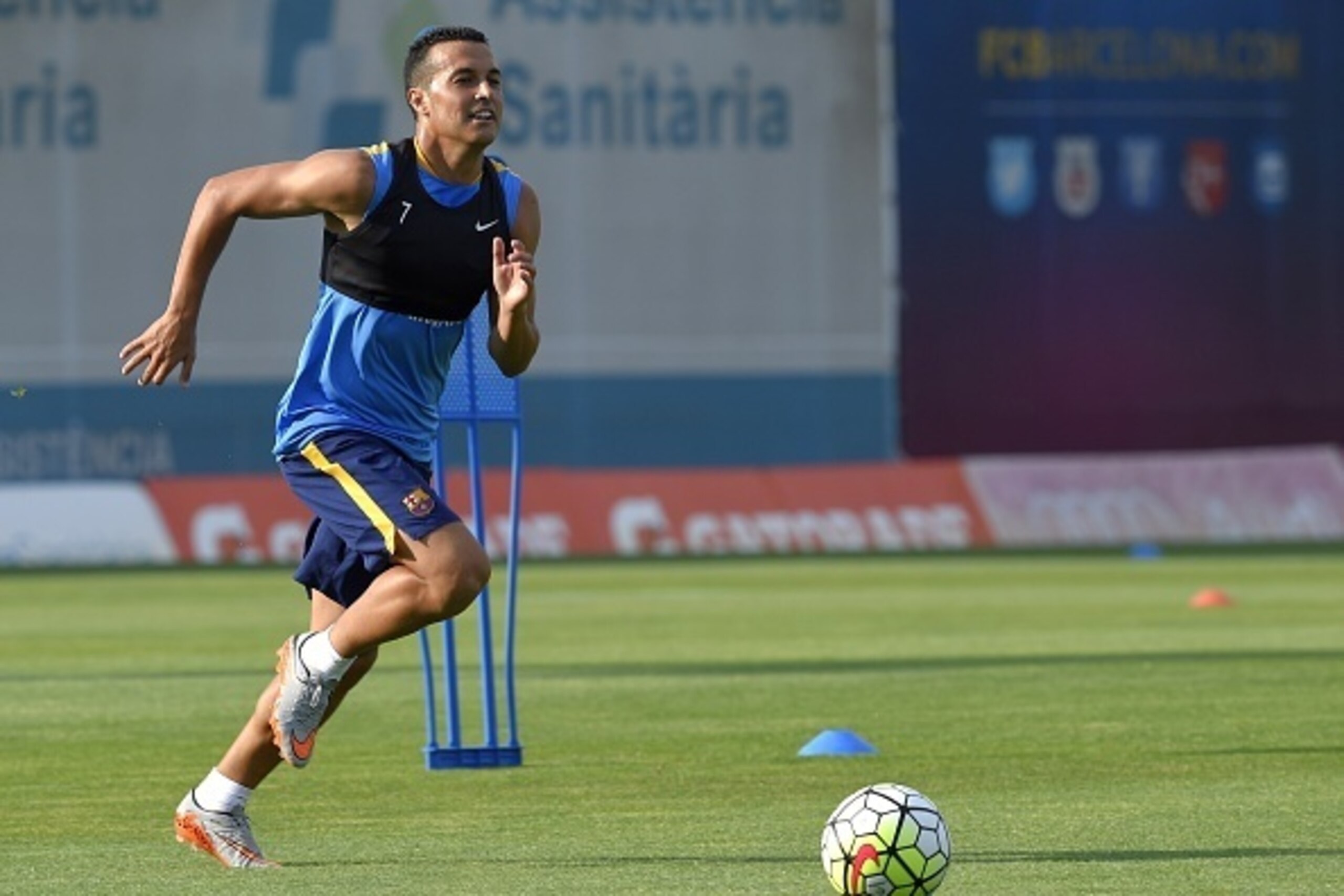 Barcelona's forward Pedro Rodriguez goes for a ball during a training session at the Sports Center FC Barcelona Joan Gamper in Sant Joan Despi, near Barcelona on July 15, 2015. AFP PHOTO/ LLUIS GENE        (Photo credit should read LLUIS GENE/AFP/Getty Im