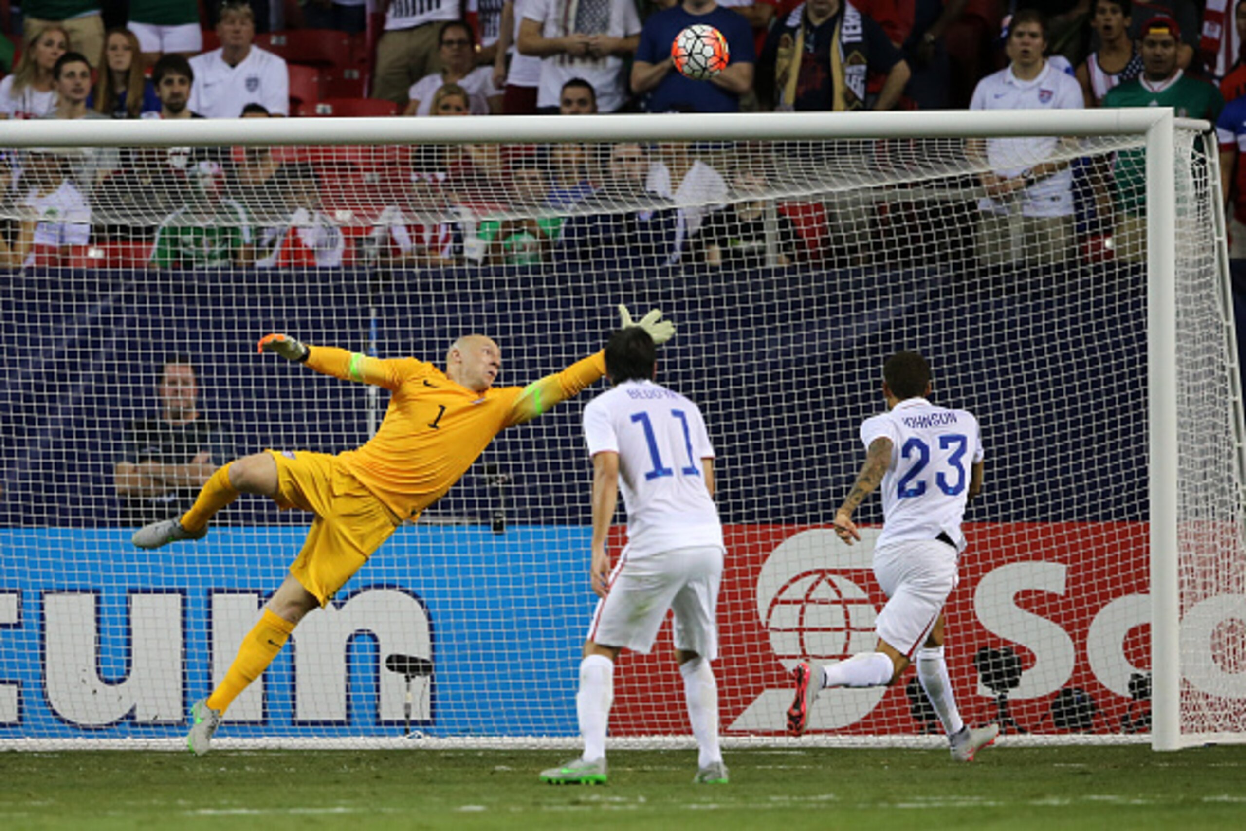 ATLANTA, GA - JULY 22:  Brad Guzan of United States of America fails to save the bass as a header from Darren Mattocks of Jamaica goes into the net to make it 0-1 during the Gold Cup Semi Final between USA and Jamaica at Georgia Dome on July 22, 2015 in A