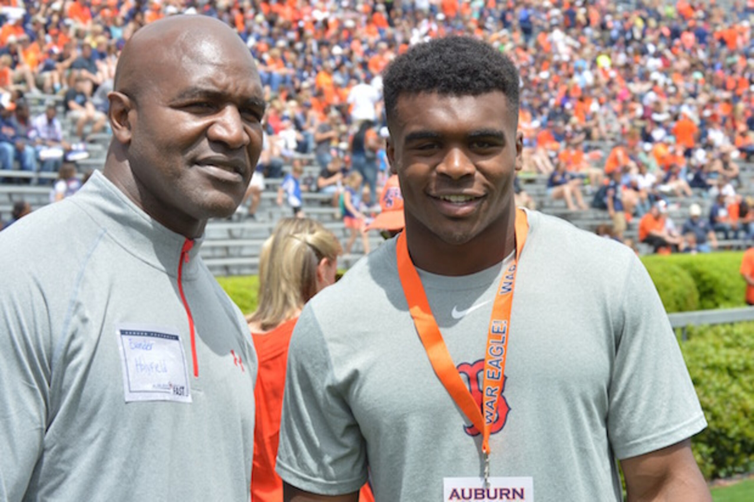 Evander Holyfield, left, and Elijah have spent significant time at Auburn.