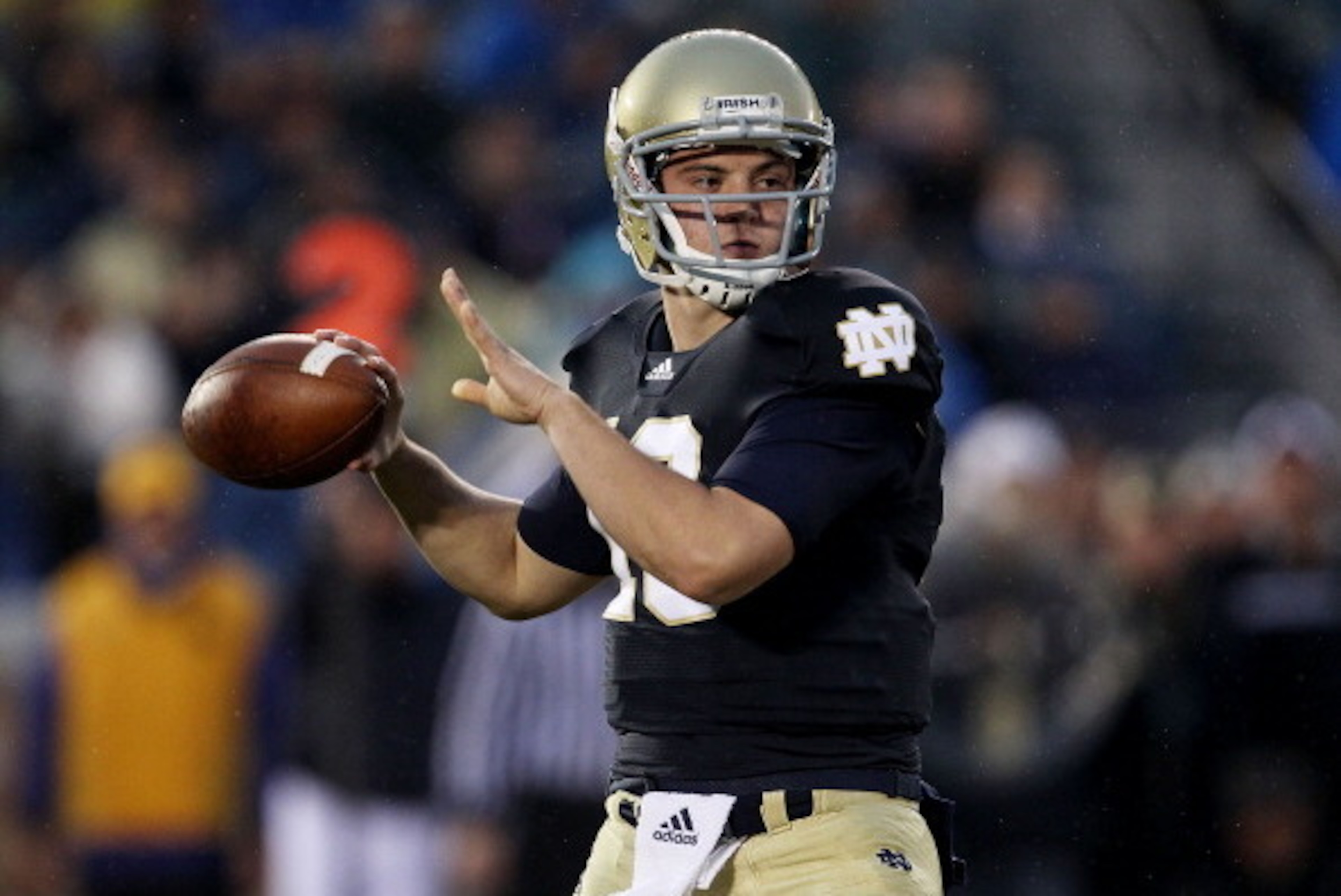 SOUTH BEND, IN - NOVEMBER 13: Tommy Rees #13 of the Notre Dame Fighting Irish throws a pass against the Utah Utes at Notre Dame Stadium on November 13, 2010 in South Bend, Indiana. (Photo by Jonathan Daniel/Getty Images)