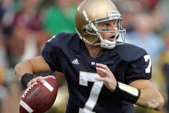 SOUTH BEND, IN - OCTOBER 13: Jimmy Clausen #7 of the Notre Dame Fighting Irish runs to pass the ball during the game against the Boston College Eagles on October 13, 2007 at Notre Dame Stadium in South Bend, Indiana. (Photo by Jonathan Daniel/Getty Images