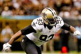 Sep 21, 2014; New Orleans, LA, USA; New Orleans Saints outside linebacker Junior Galette (93) against the Minnesota Vikings during the second half of a game at Mercedes-Benz Superdome. The Saints defeated the Vikings 20-9. Mandatory Credit: Derick E. Hing