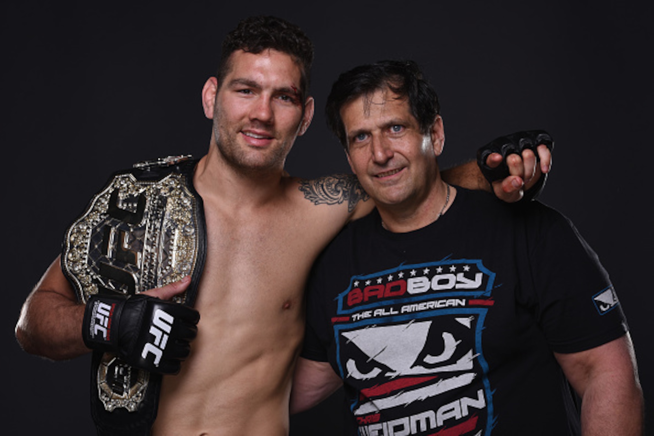LAS VEGAS, NV - MAY 23:  (L-R) Chris Weidman and trainer Ray Longo pose for a post-fight portrait backstage during the UFC 187 event at the MGM Grand Garden Arena on May 23, 2015 in Las Vegas, Nevada.  (Photo by Mike Roach/Zuffa LLC/Zuffa LLC via Getty Im