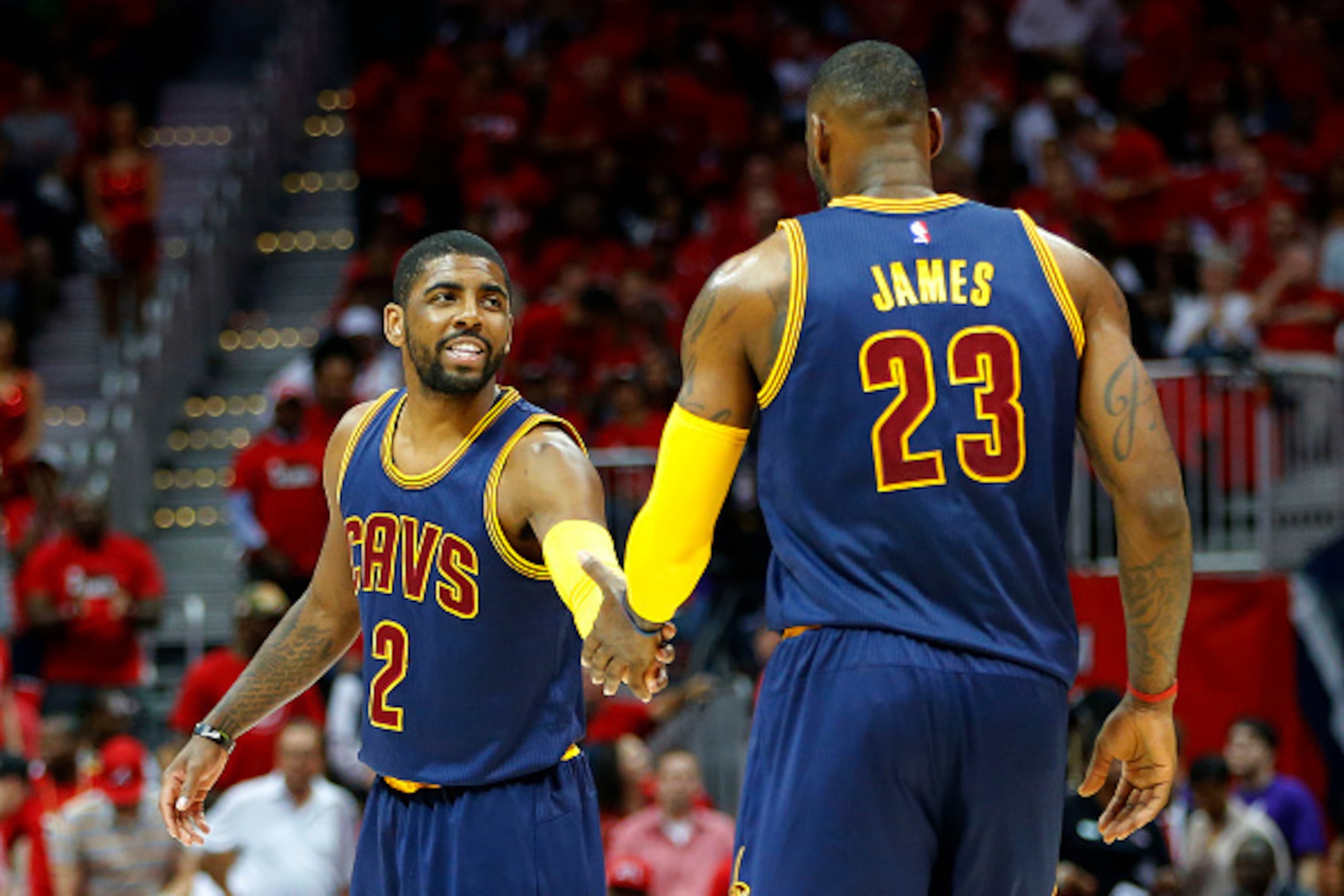 ATLANTA, GA - MAY 20:  Kyrie Irving #2 and LeBron James #23 of the Cleveland Cavaliers celebrate in the first quarter against the Atlanta Hawks during Game One of the Eastern Conference Finals of the 2015 NBA Playoffs at Philips Arena on May 20, 2015 in A