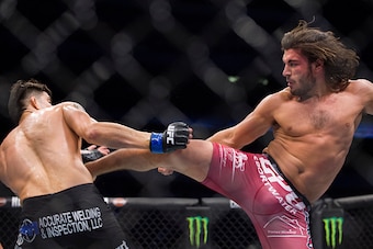 DALLAS, TX - MARCH 14:  Elias Theodorou kicks Roger Narvaez during UFC 185 at the American Airlines Center on March 14, 2015 in Dallas, Texas. (Photo by Cooper Neill/Zuffa LLC/Zuffa LLC via Getty Images)