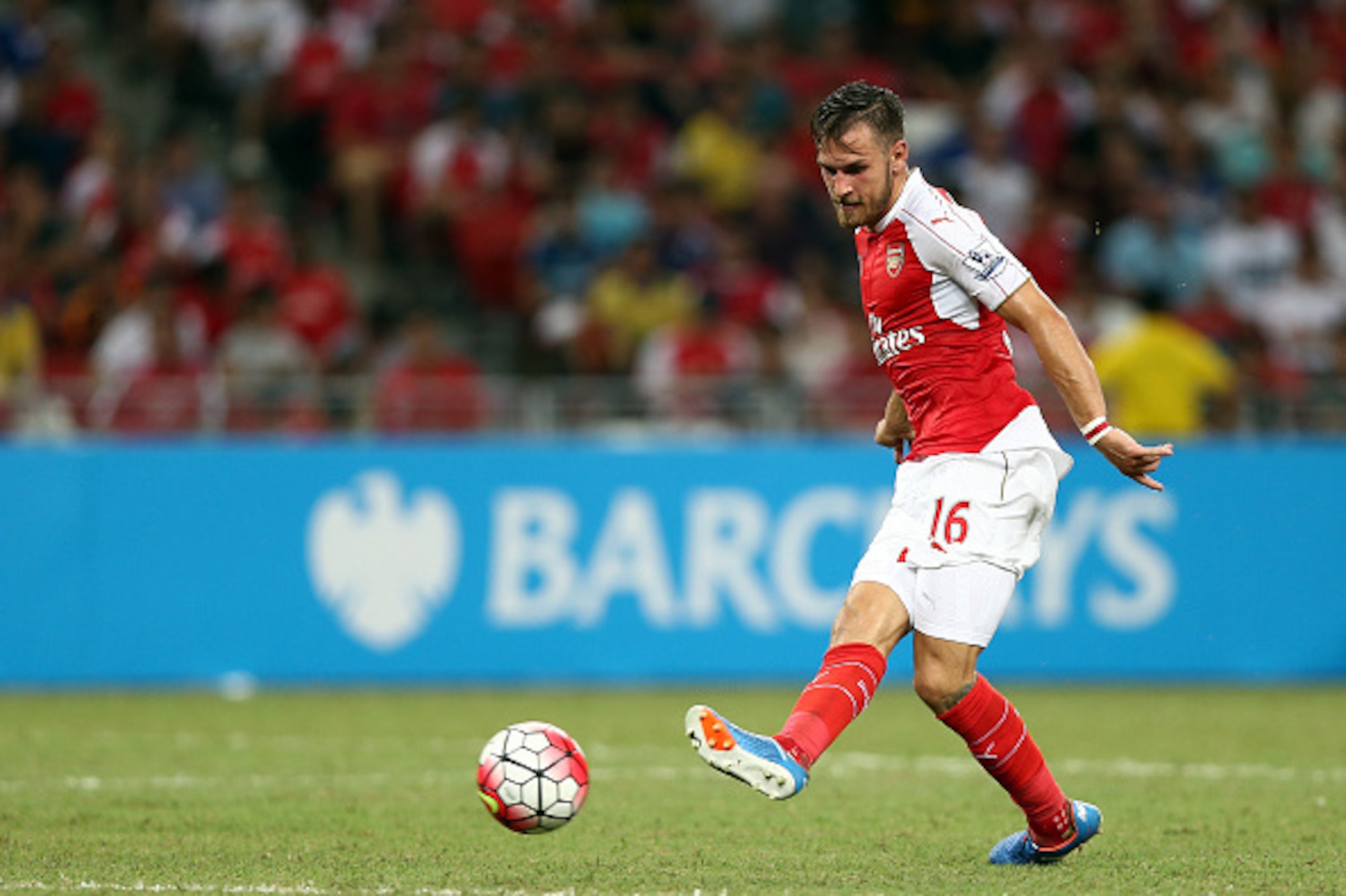 SINGAPORE - JULY 18:  Aaron Ramsey of Arsenal in action during the Barclays Asia Trophy final match between Arsenal and Everton at the National Stadium on July 18, 2015 in Singapore.  (Photo by Stanley Chou/Getty Images)