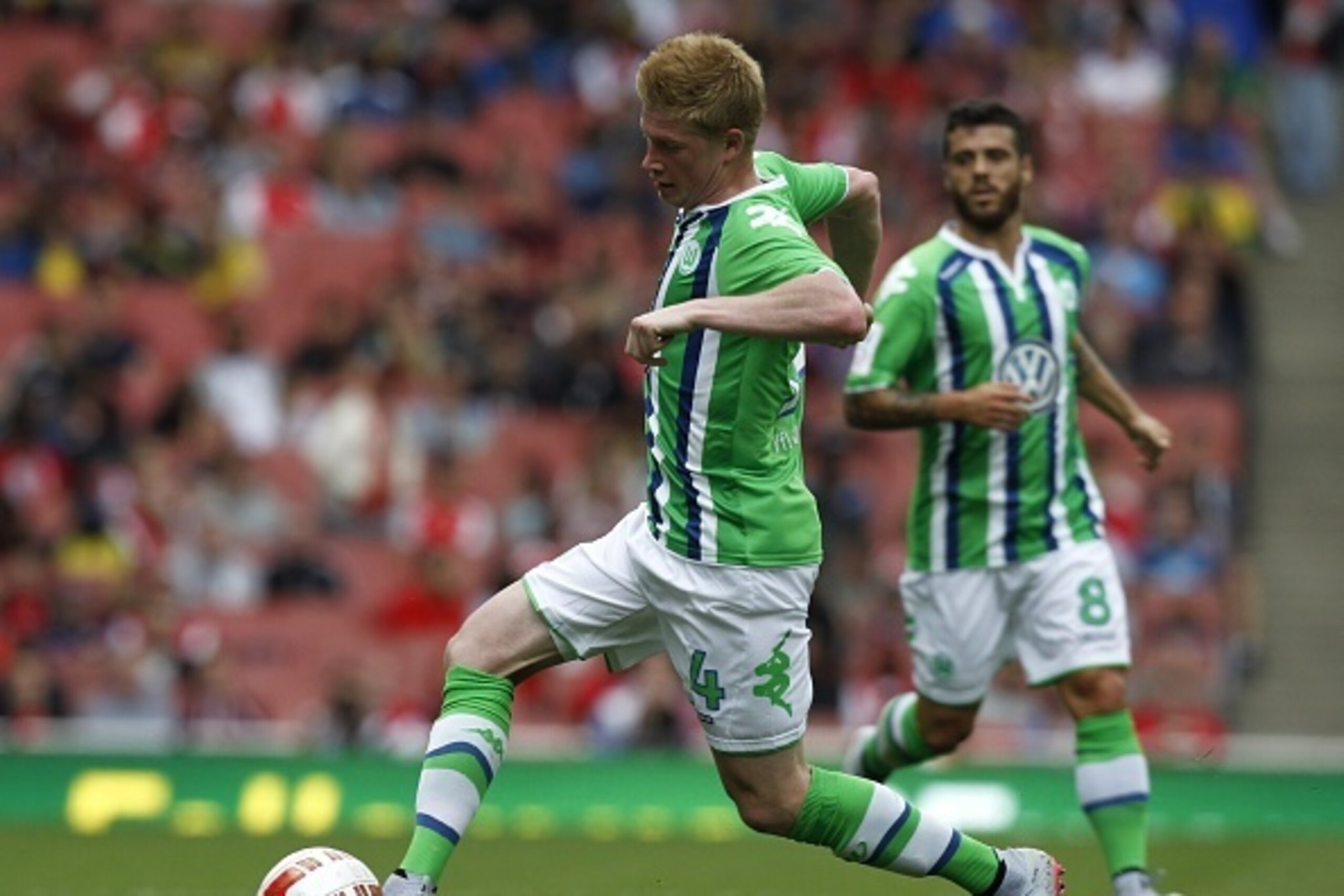 Wolfsburgs Belgium midfielder Kevin De Bruyne runs with the ball during the pre-season friendly football match between Wolfsburg and Villarreal at The Emirates Stadium in north London on July 25, 2015, the game is one of four matches played over two days Wolfsburgs Belgium midfielder Kevin De Bruyne runs with the ball during the pre-season friendly football match between Wolfsburg and Villarreal at The Emirates Stadium in north London on July 25, 2015, the game is one of four matches played over two days