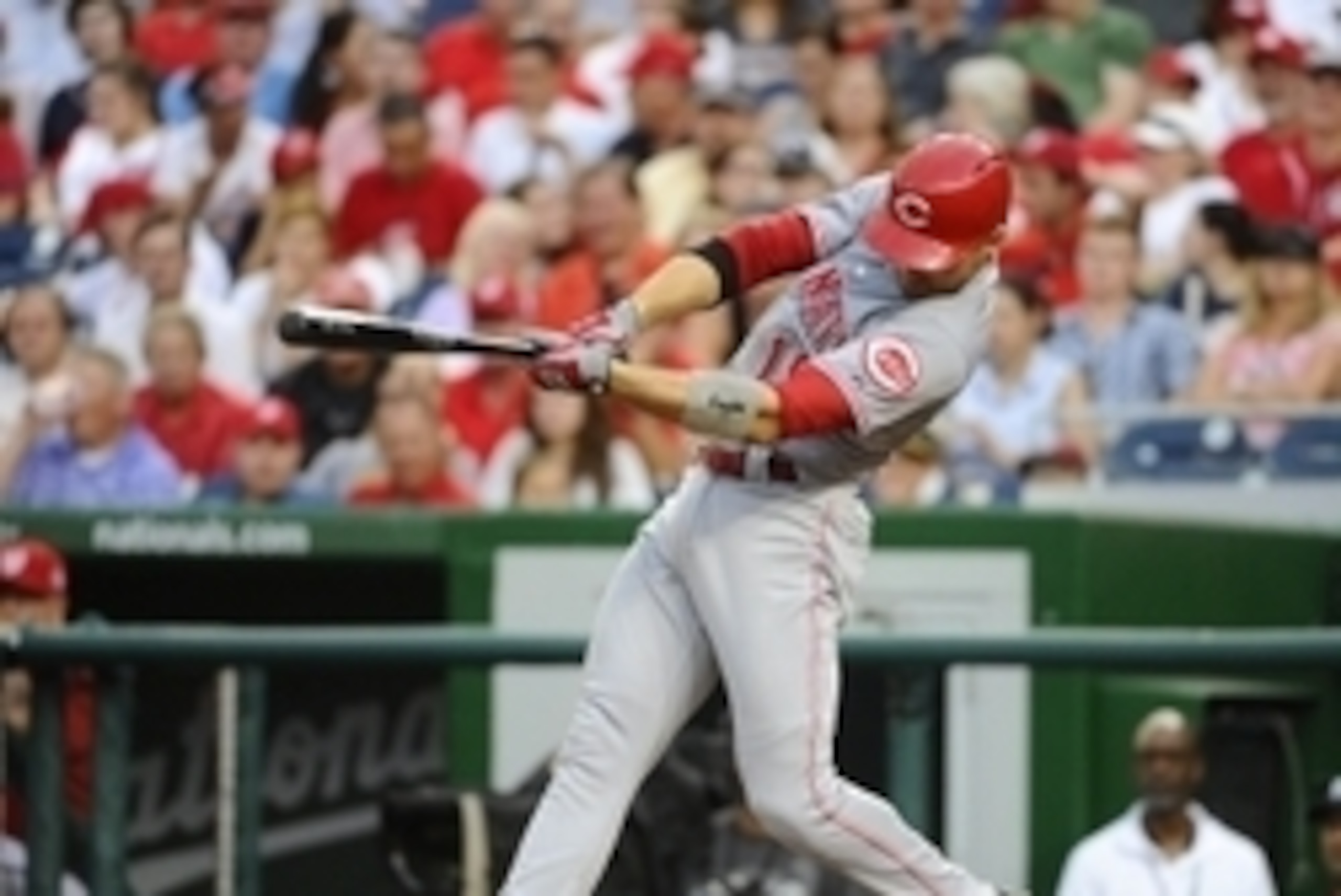 Jul 6, 2015; Washington, DC, USA; Cincinnati Reds first baseman Joey Votto (19) singles against the Washington Nationals during the third inning at Nationals Park. Mandatory Credit: Brad Mills-USA TODAY Sports