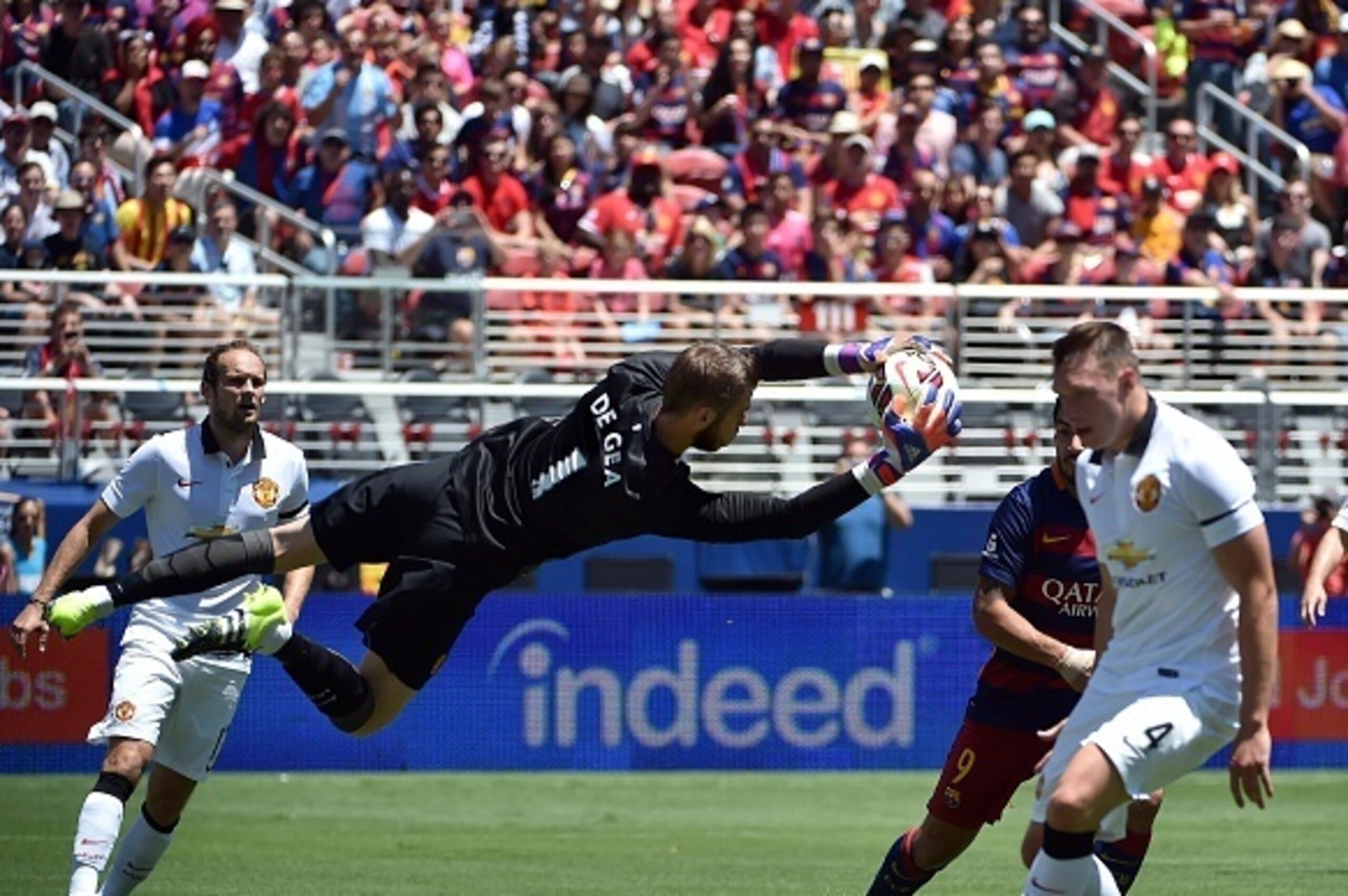 Goalie David De Gea of Manchester United blocks a kick during the International Champions Cup match between Manchester United and FC Barcelona at Levi's Stadium in Santa Clara, California on July 25, 2015. Manchester United won the match 3-1. AFP PHOTO/ J Goalie David De Gea of Manchester United blocks a kick during the International Champions Cup match between Manchester United and FC Barcelona at Levi's Stadium in Santa Clara, California on July 25, 2015. Manchester United won the match 3-1. AFP PHOTO/ J