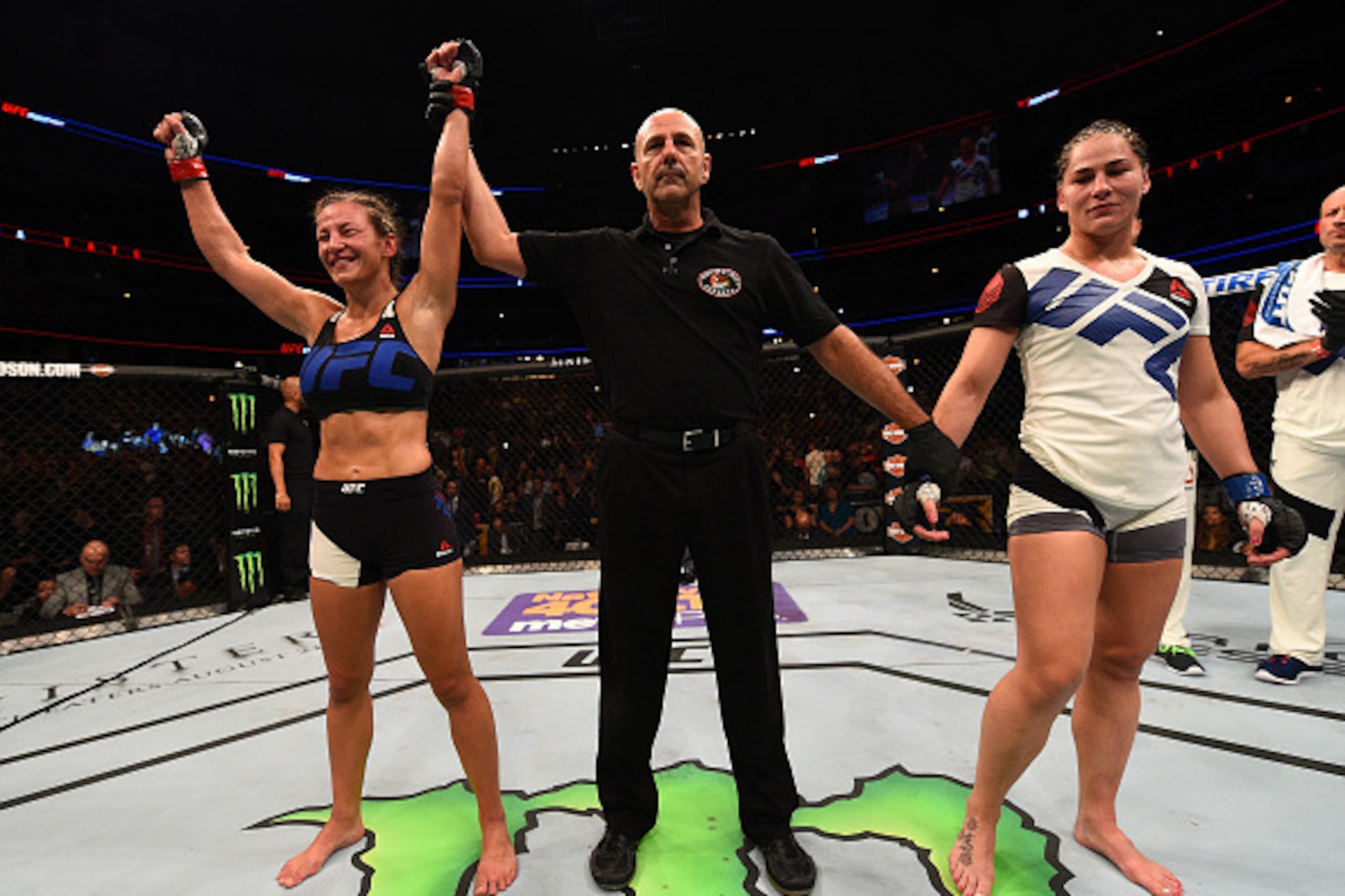 CHICAGO, IL - JULY 25: Miesha Tate (L) reacts after he unanimous-decision victory over Jessica Eye in their women's bantamweight bout during the UFC event at the United Center on July 25, 2015 in Chicago, Illinois. (Photo by Jeff Bottari/Zuffa LLC/Zuffa CHICAGO, IL - JULY 25: Miesha Tate (L) reacts after he unanimous-decision victory over Jessica Eye in their women's bantamweight bout during the UFC event at the United Center on July 25, 2015 in Chicago, Illinois. (Photo by Jeff Bottari/Zuffa LLC/Zuffa