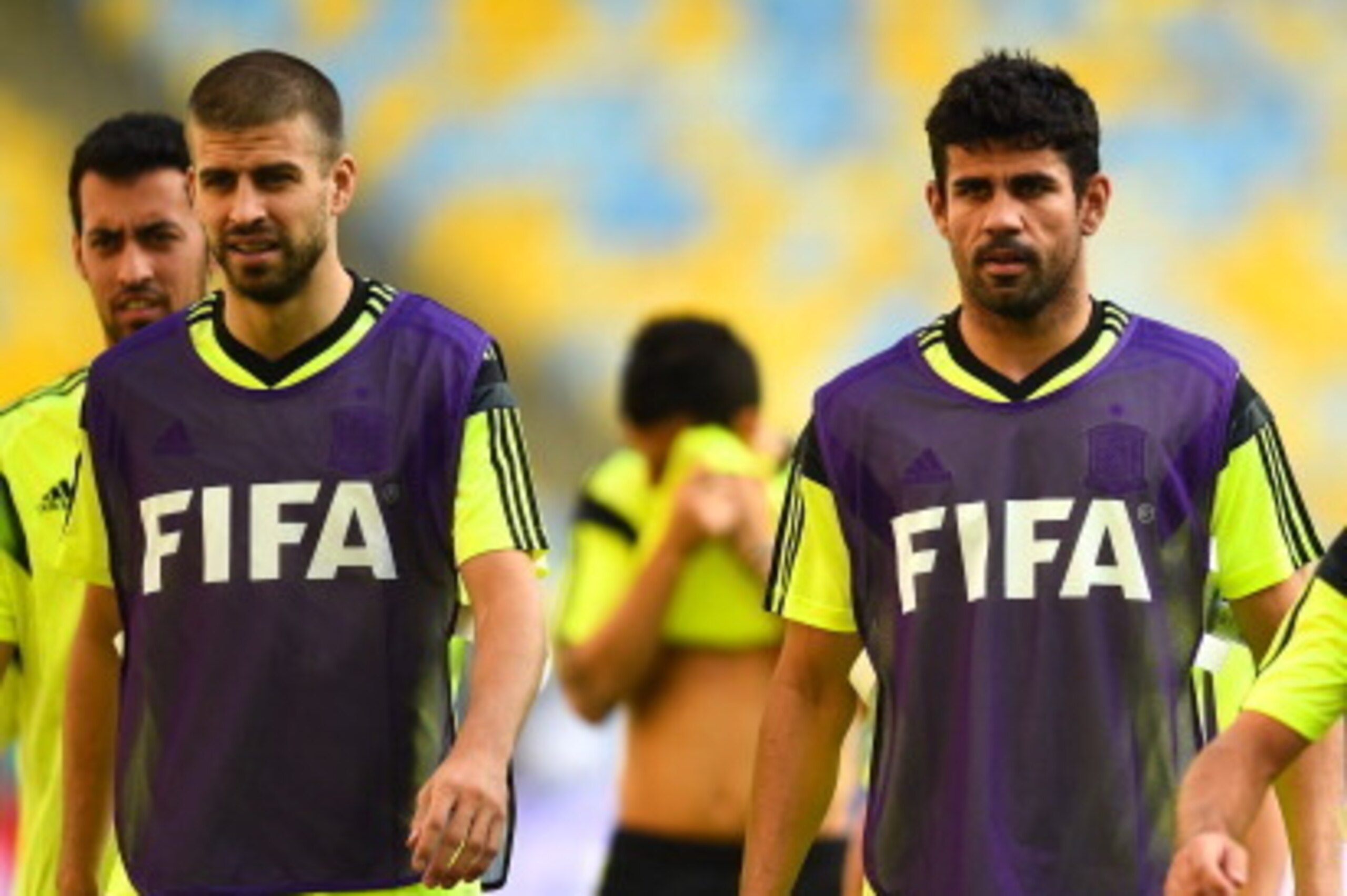 RIO DE JANEIRO, BRAZIL - JUNE 17: (L-R) Gerard Pique, Diego Costa and Xavi Hernandez of Spain look on during a Spain training session ahead of their 2014 FIFA World Cup Group B match against Chile at Maracana on June 17, 2014 in Rio de Janeiro, Brazil.  (