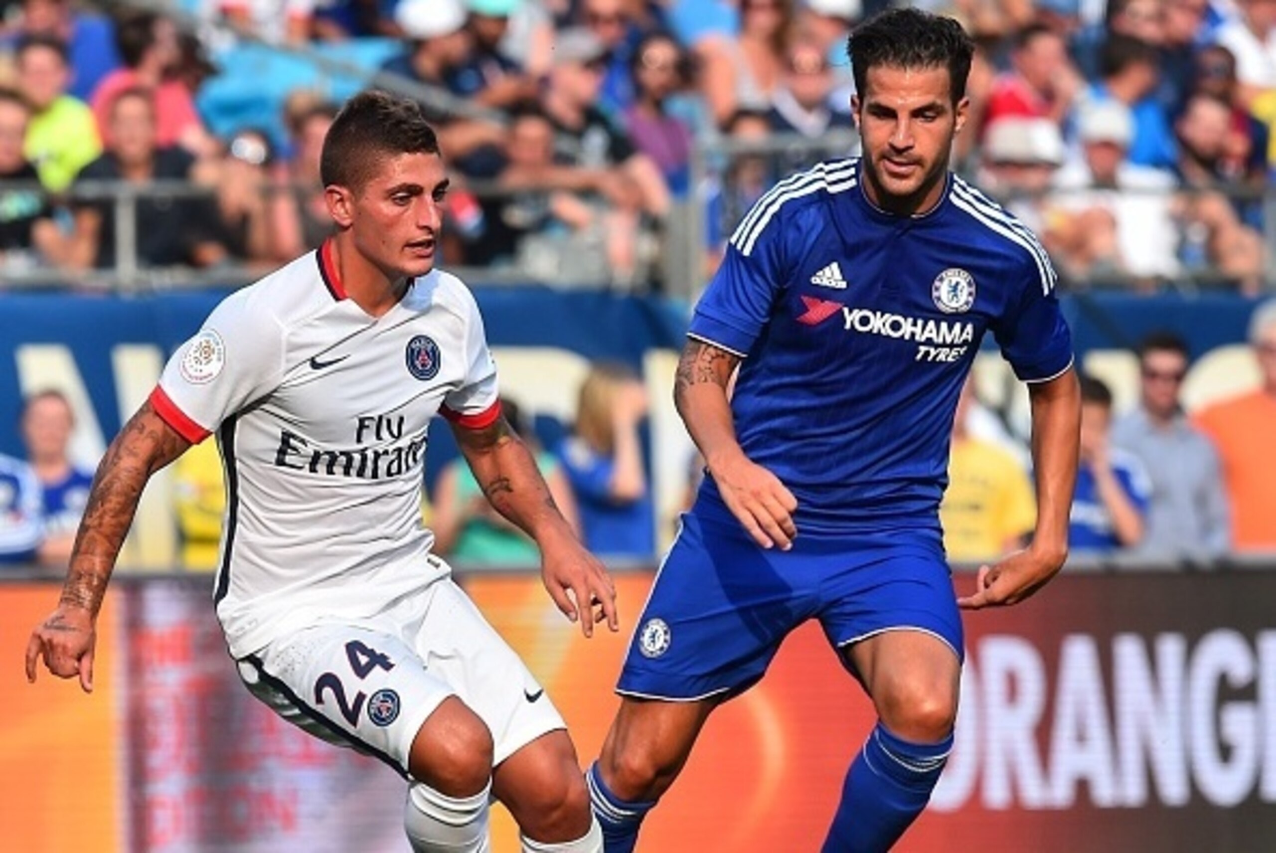 Paris Saint-Germain's Marco Verratti (L) vies with Chelsea's Cesc Fabregas during an International Champions Cup football match against in Charlotte, North Carolina, on July 25, 2015.    AFP PHOTO/NICHOLAS KAMM        (Photo credit should read NICHOLAS KA
