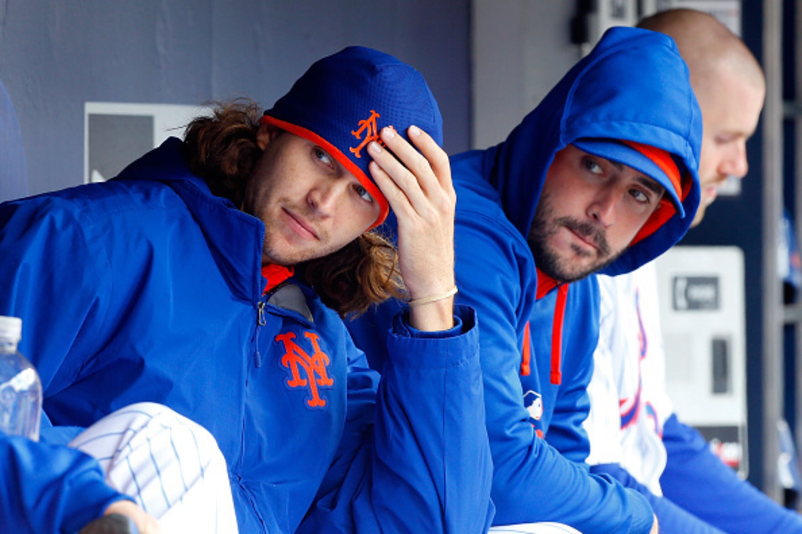 NEW YORK, NY - APRIL 23:  Jacob deGrom #48 (L) and Matt Harvey #33 of the New York Mets look on against the Atlanta Braves at Citi Field on April 23, 2015 in the Flushing neighborhood of the Queens borough of New York City. The Mets defeated the Braves 6-
