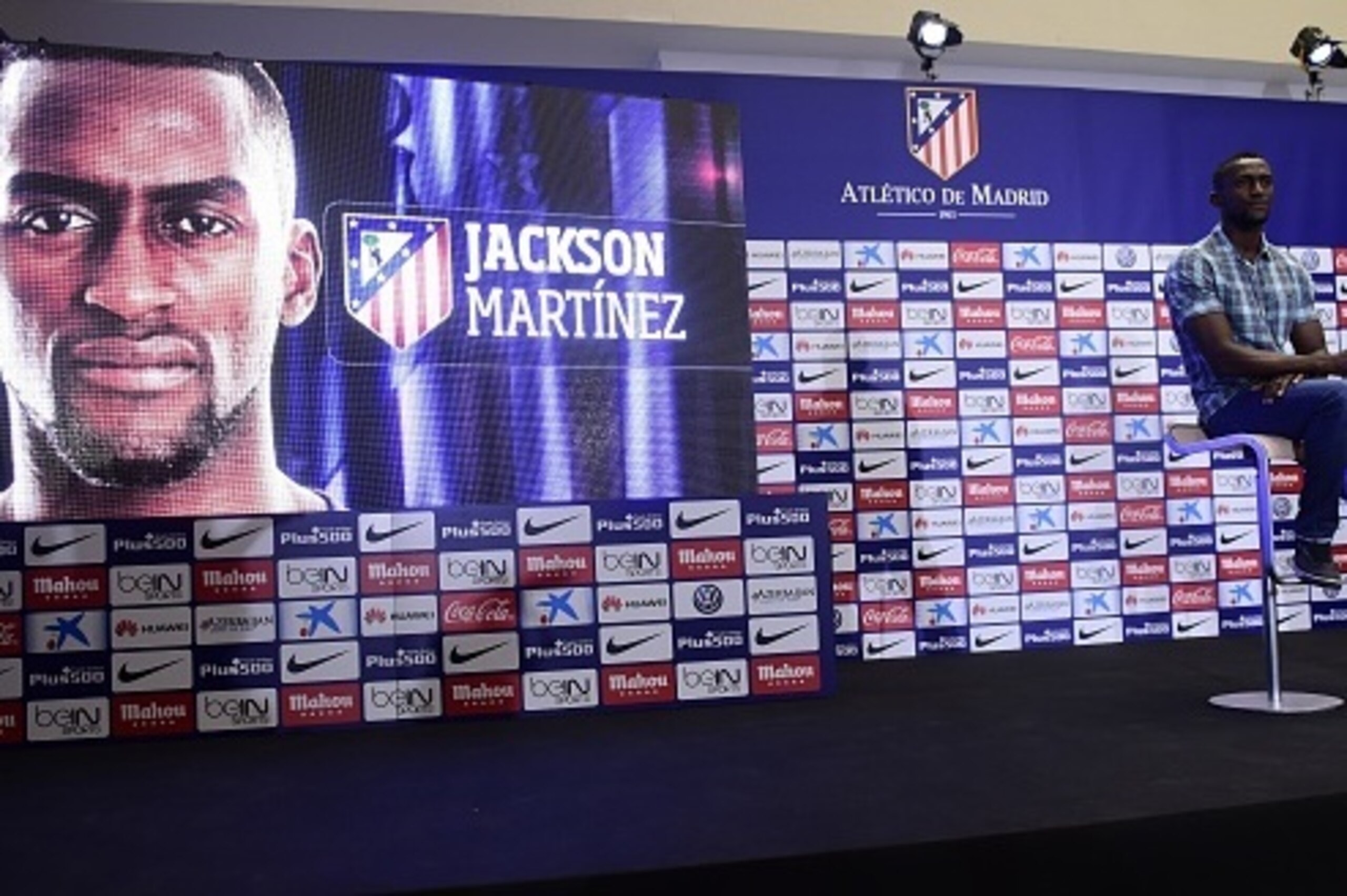 Atletico de Madrid's new football signing Colombian Jakson Martinez listens as he attends a press conference for his presentation at Vicente Calderon stadium in Madrid on July 26, 2015. AFP PHOTO/ PIERRE-PHILIPPE MARCOU        (Photo credit should read PI
