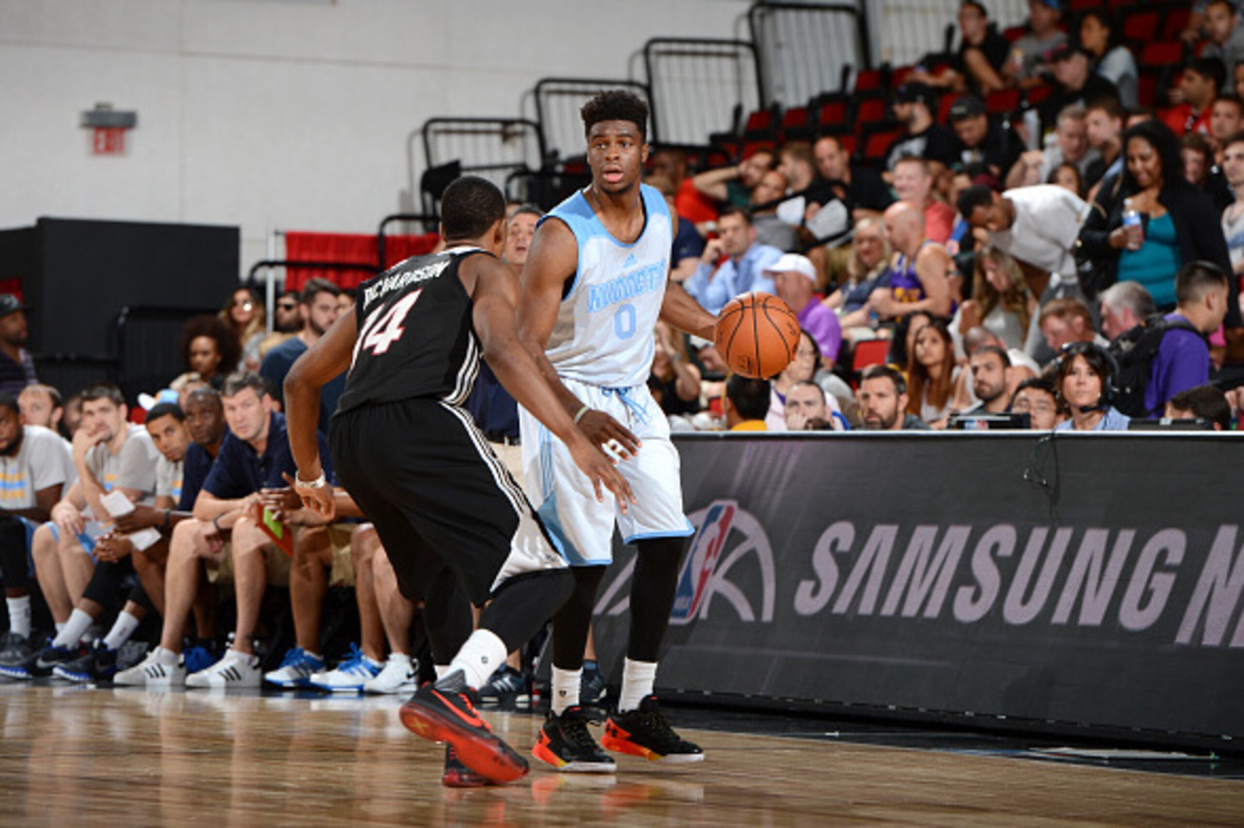 LAS VEGAS, NV - JULY 13: Emmanuel Mudiay #0 of the Denver Nuggets handles the ball against the Miami Heat on July 13, 2015 at The Cox Pavilion in Las Vegas, Nevada. NOTE TO USER: User expressly acknowledges and agrees that, by downloading and or using thi