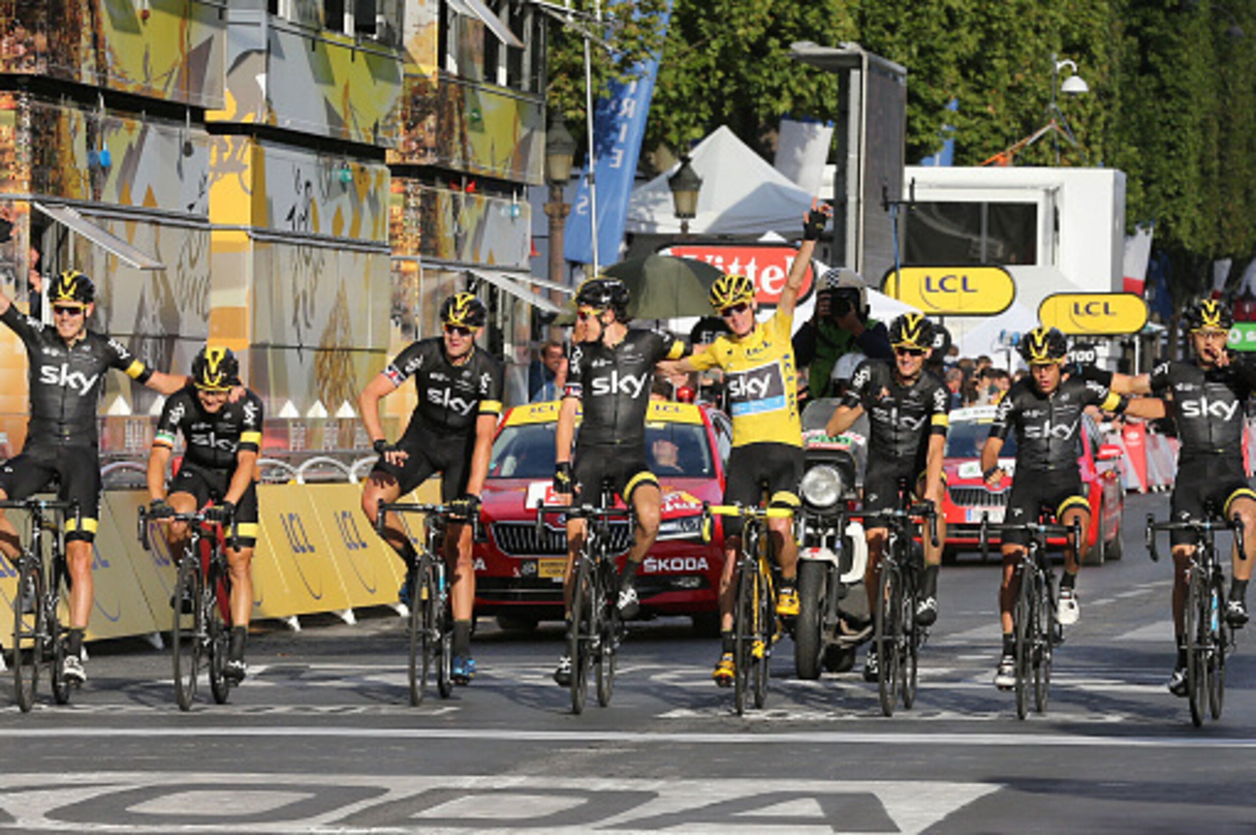 PARIS, FRANCE - JULY 26: Tour de France winner Chris Froome of Great Britain and Team Sky (yellow jersey) is surrounded by his teammates Luke Rowe of Great Britain, Nicolas Roche of Ireland, Ian Stannard of Great Britain, Geraint Thomas of Great Britain, PARIS, FRANCE - JULY 26: Tour de France winner Chris Froome of Great Britain and Team Sky (yellow jersey) is surrounded by his teammates Luke Rowe of Great Britain, Nicolas Roche of Ireland, Ian Stannard of Great Britain, Geraint Thomas of Great Britain,