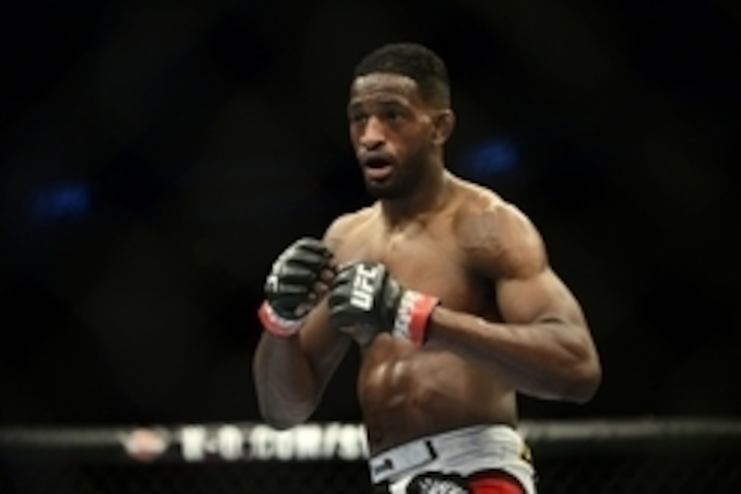 Feb 14, 2015; Broomfield, CO, USA; Neil Magny (red) during the fight against Kiichi Kunimoto (not pictured) during the UFC Fight Night at the 1stBANK Center. Mandatory Credit: Ron Chenoy-USA TODAY Sports